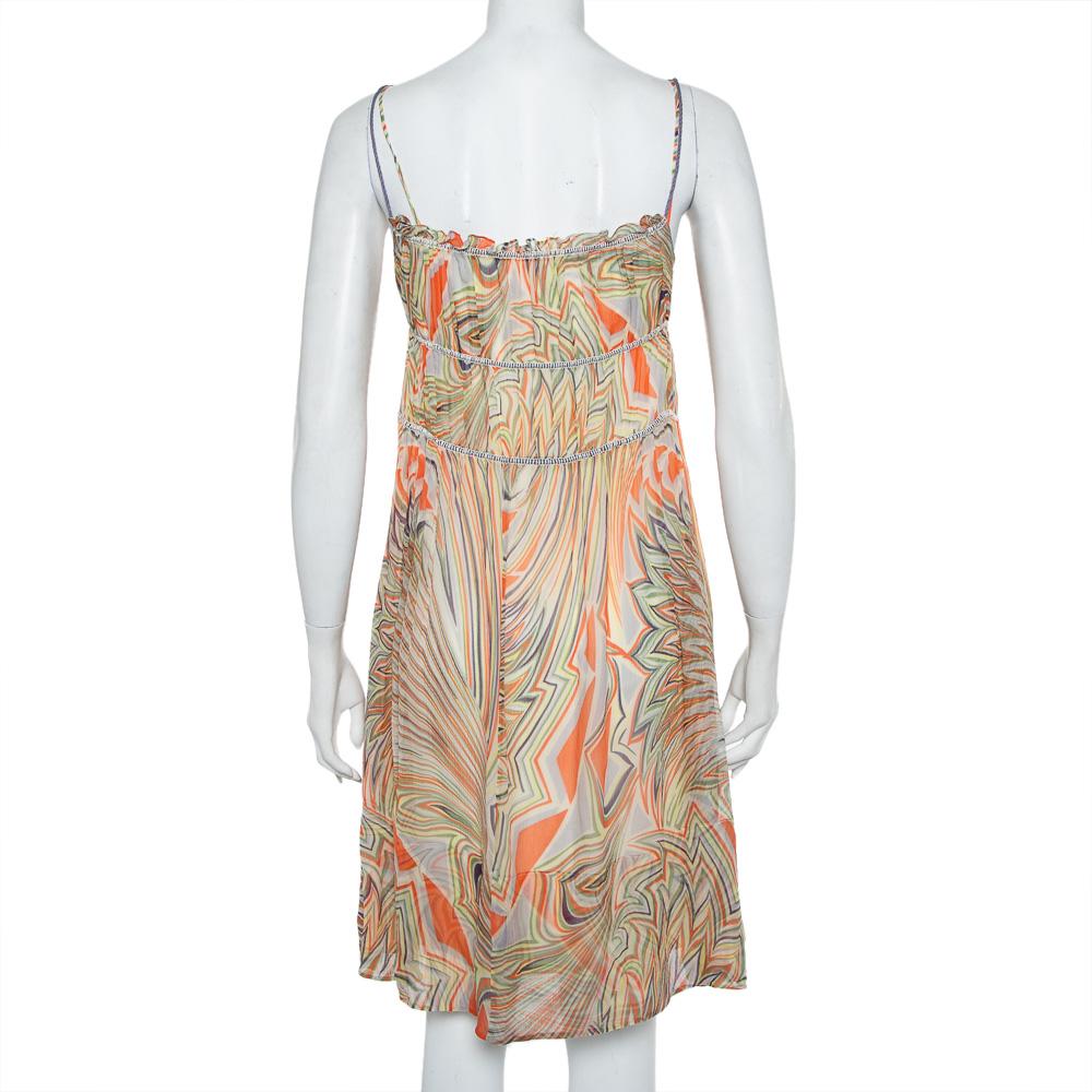 Look fabulous in this chic printed multicolored outfit as you go out and about town. Elegant and stylish, this chiffon dress is a classic in any fashionista's collection. It is lightweight, sleeveless, and has a self-tie detail in the front.

