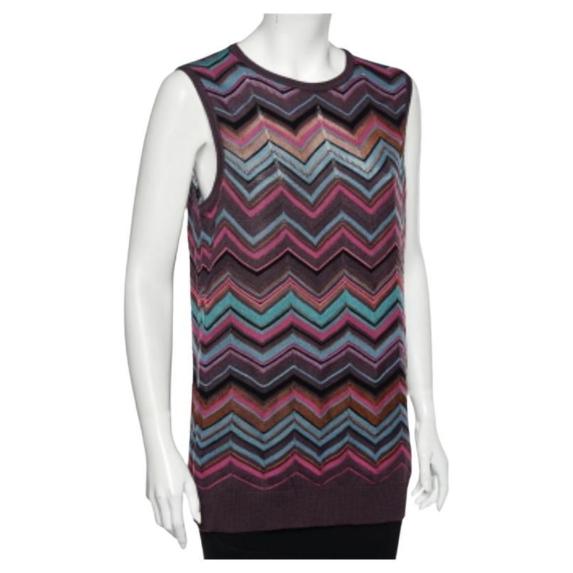 Questo top illustra magnificamente l'approccio di M Missoni agli amori e ai design. Tagliata per una vestibilità slim in tessuto a maglia, presenta una lavorazione a maglia traforata, una silhouette senza maniche e un collo rotondo. Abbinalo a