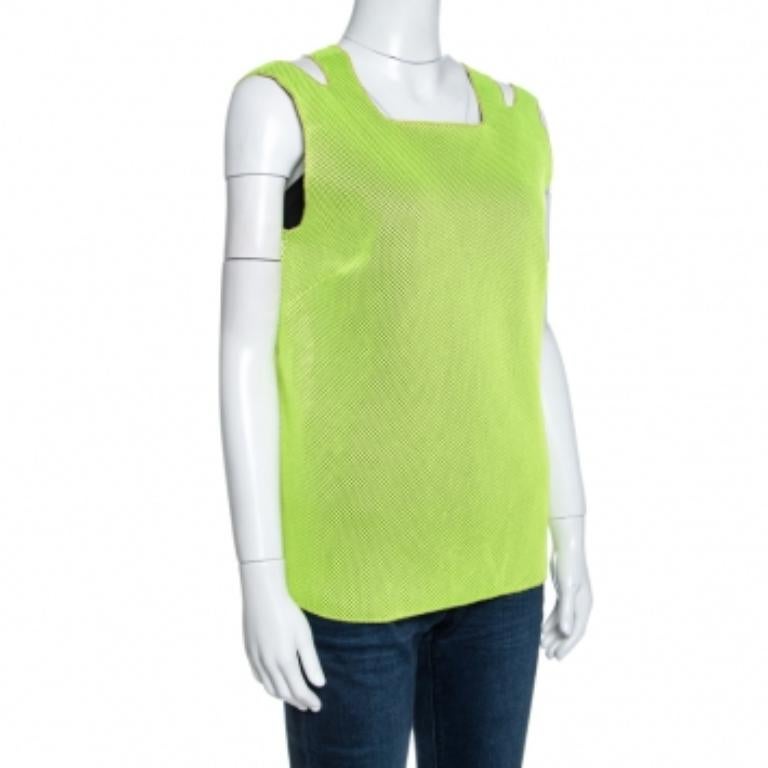 Dieses hübsche Tank-Top von M Missoni ist ein Muss für jeden Kleiderschrank. Er ist aus hochwertigen MATERIALEN gefertigt und hat eine neongrüne Farbe. Dieses Oberteil aus Mesh-Strick ist mit interessanten Ausschnitten versehen, hat einen