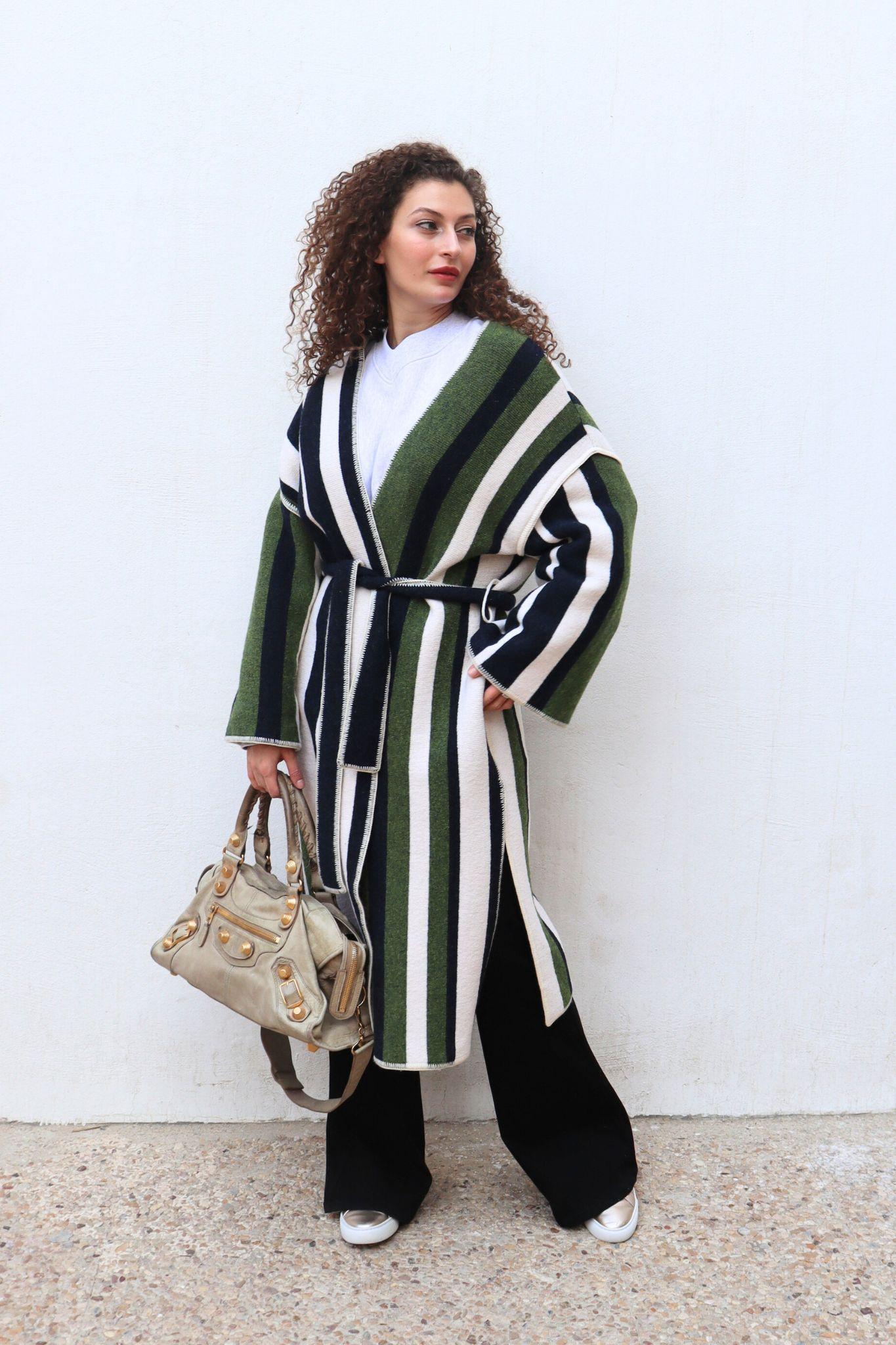 Oversized striped jacquard-knit wool-blend coat, Features a Jacquard-knit, Wool-blend, Two front patch pockets and a waist belt.
Material: 97% Wool 3% Polyamide
Size: IT 44 / Large
Bust: 94cm
Waist: 76cm
Hip: 101cm
Overall Condition: Excellent
