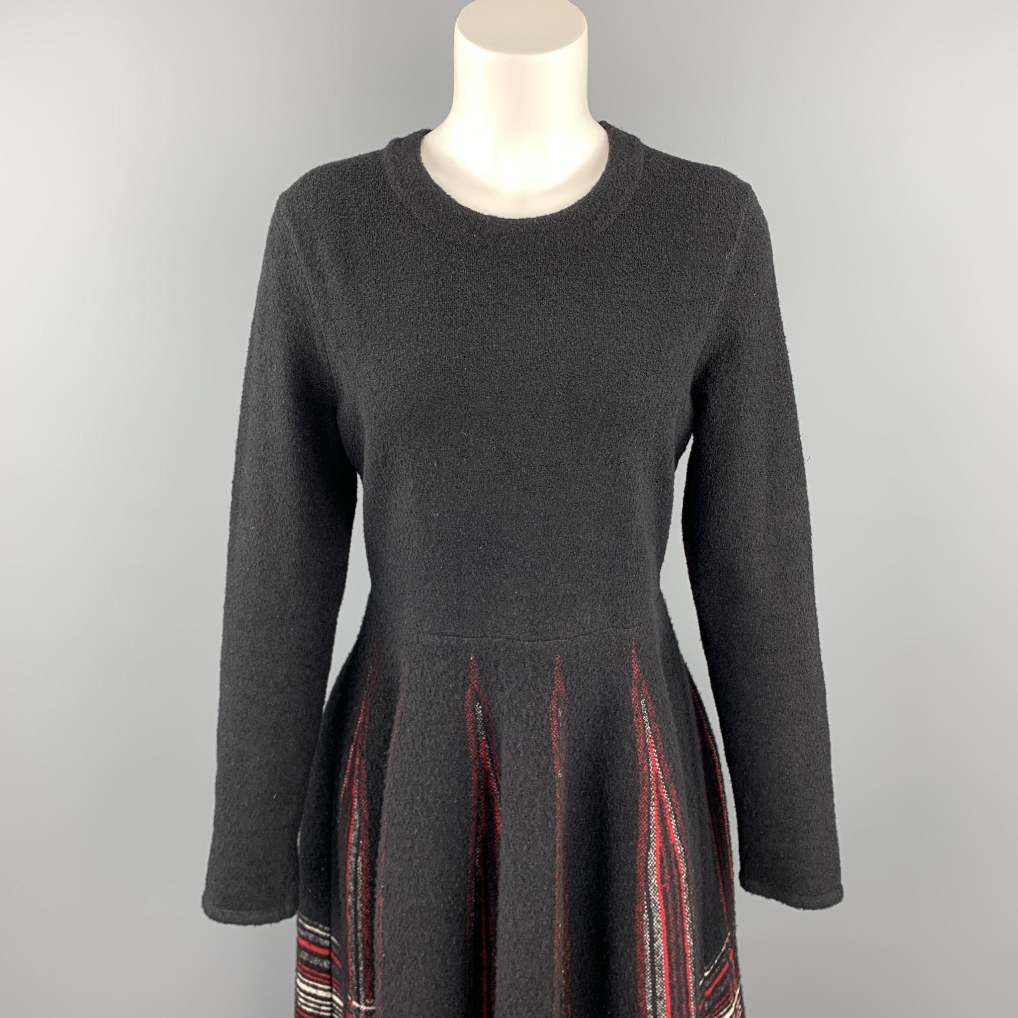 M MISSONI dress comes in a black & red knitted plaid polyamide blend featuring long sleeves and an a-line skirt. Made in Italy.

Good Pre-Owned Condition.
Marked: IT 46

Measurements:

Shoulder: 16.5 in. 
Bust: 35 in. 
Waist: 32 in. 
Hip: 50 in.