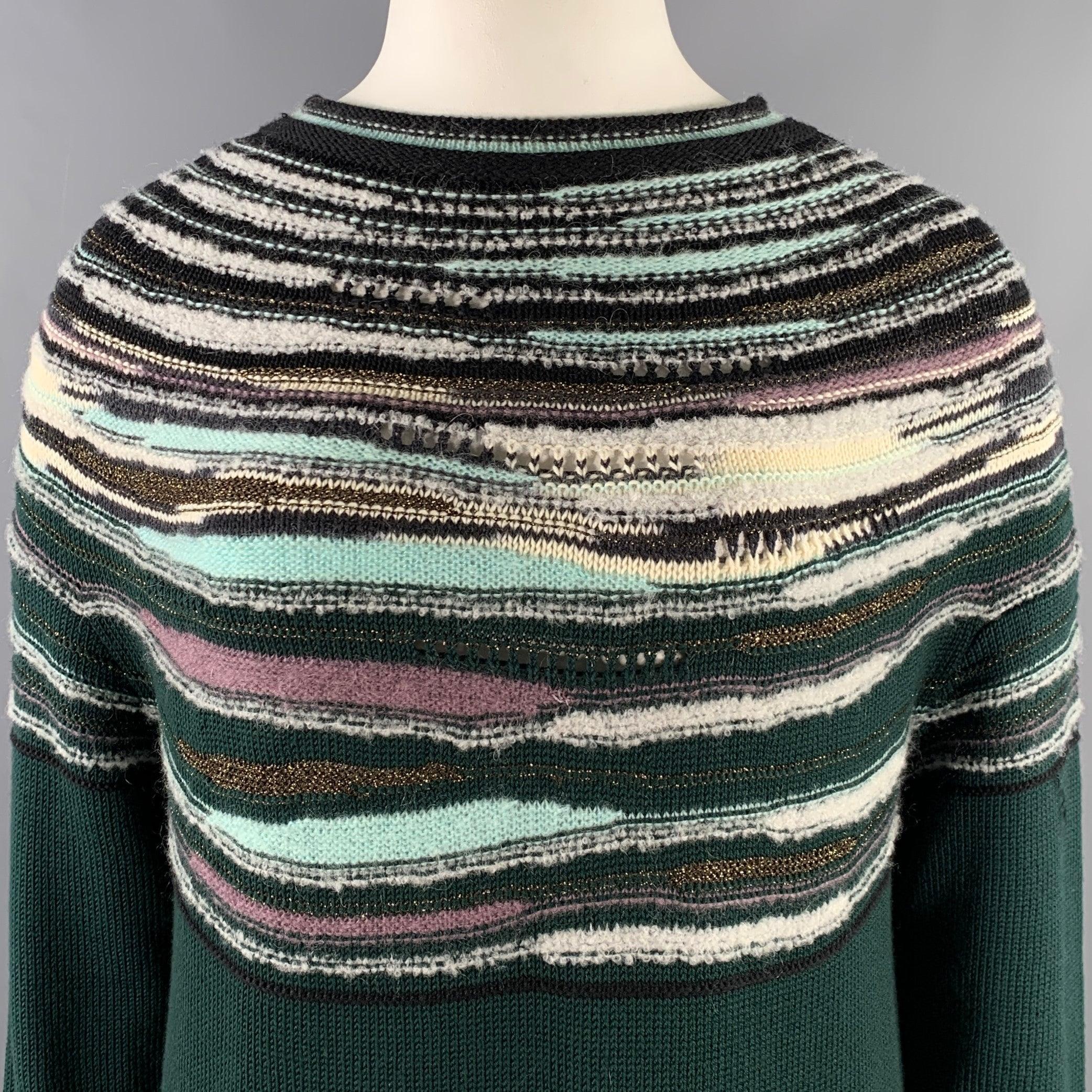 M MISSONI sweater dress in a multi-color wool blend knit featuring long sleeves, stripe design, and crew-neck. Made in Italy. Excellent Pre-Owned Condition. 

Marked:   IT 48  

Measurements: 
 
Shoulder: 24 inches  Bust: 46 inches  Sleeve: 20.5