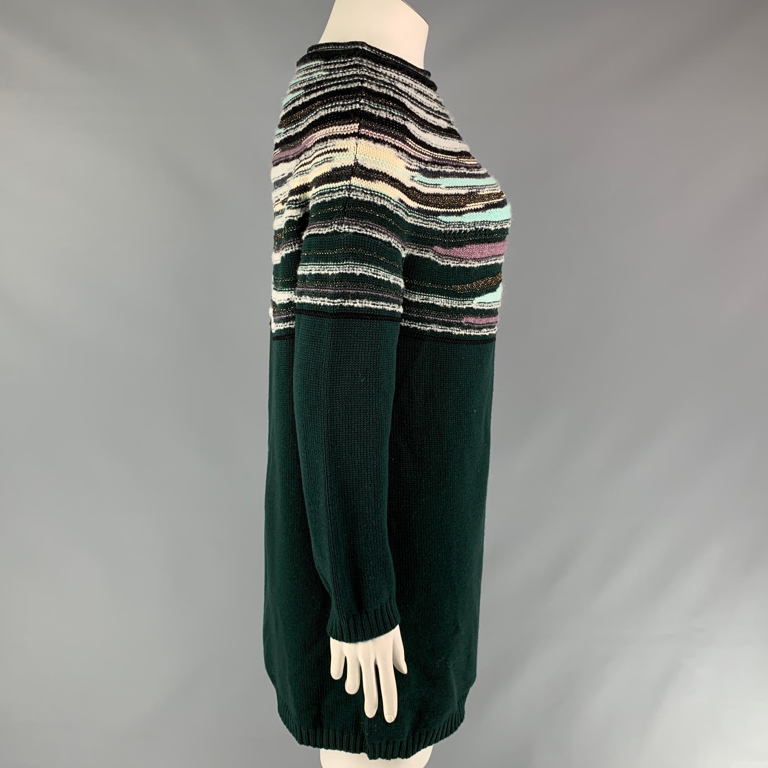 M MISSONI sweater comes in a multi-color knitted wool featuring long sleeves and a crew-neck. Made in Italy.

Very Good Pre-Owned Condition.
Marked: I 48 / D CH 42 / A NL 42 / EFB 44 / GB 16 / USA 12

Measurements:

Shoulder: 24 in.
Bust: 46