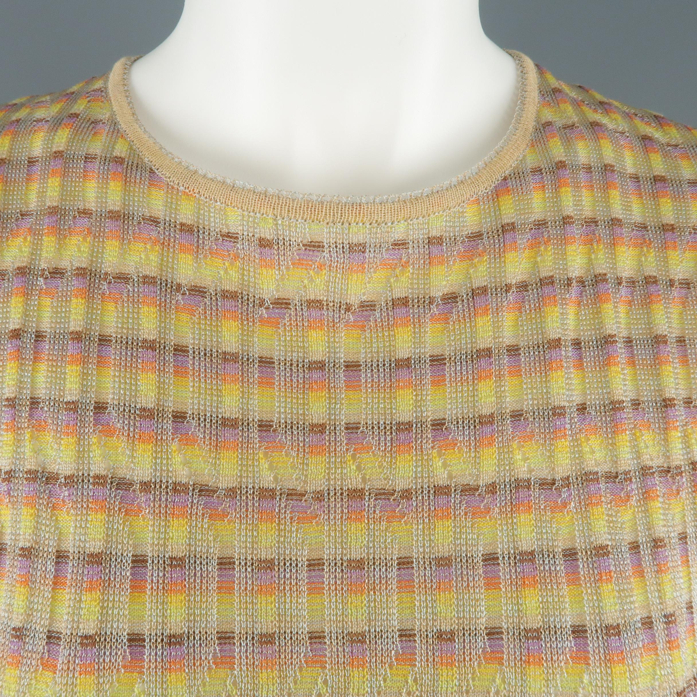 M MISSONI short sleeve top comes in metallic beige textured knit with an all over rainbow stripe pattern, round neckline, and short sleeves. Matching cardigan available separately. Made in Italy.
 
Excellent Pre-Owned Condition.
Marked:
