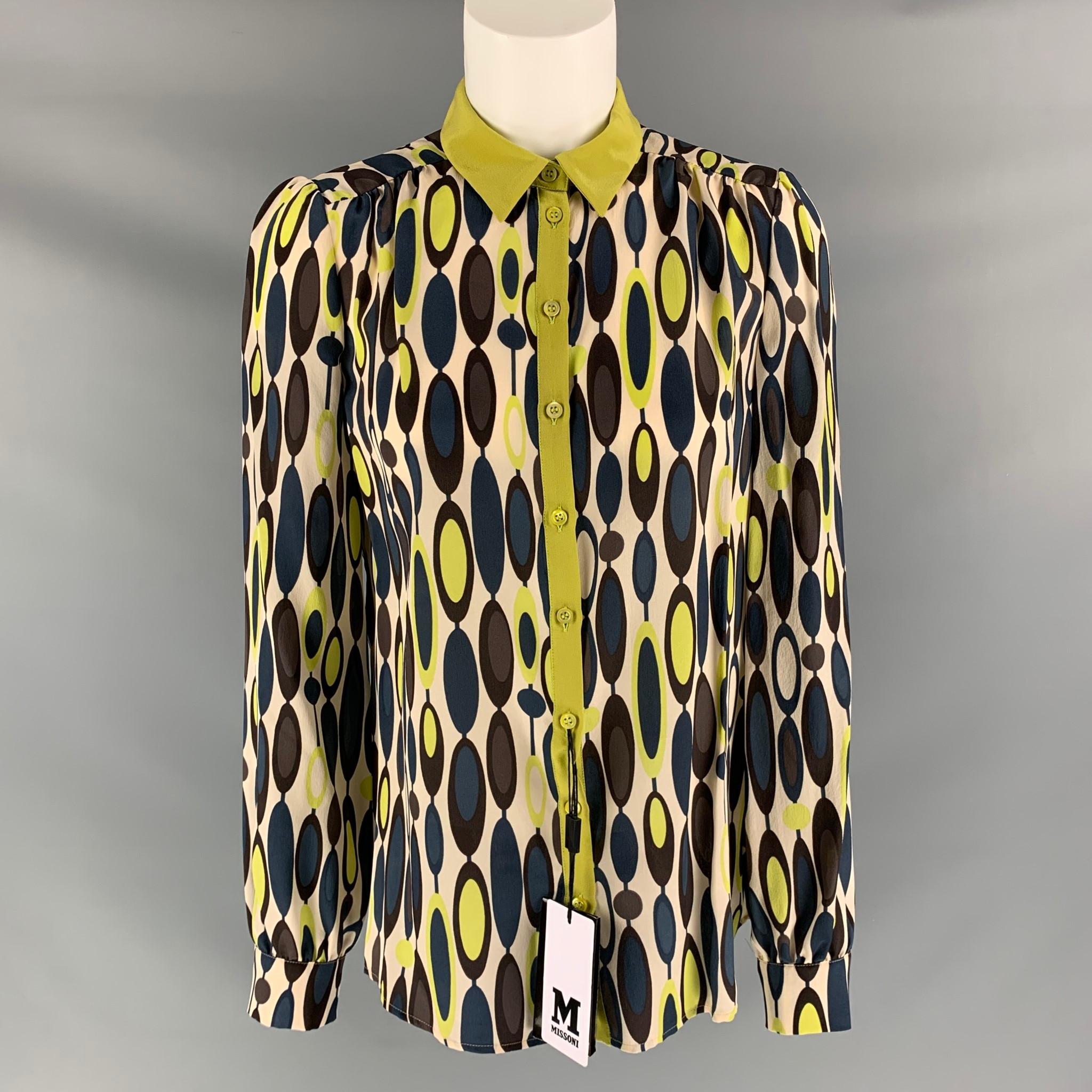 M MISSONI blouse comes in green, blue and cream silk with abstract print features a green collar and button down closure. Made in Italy.

New with Tag.
Marked: 40IT 4USA

Measurements:

Shoulder: 17 in
Bust: 19 in
Sleeve: 24.5 in
Length: 25.5 in