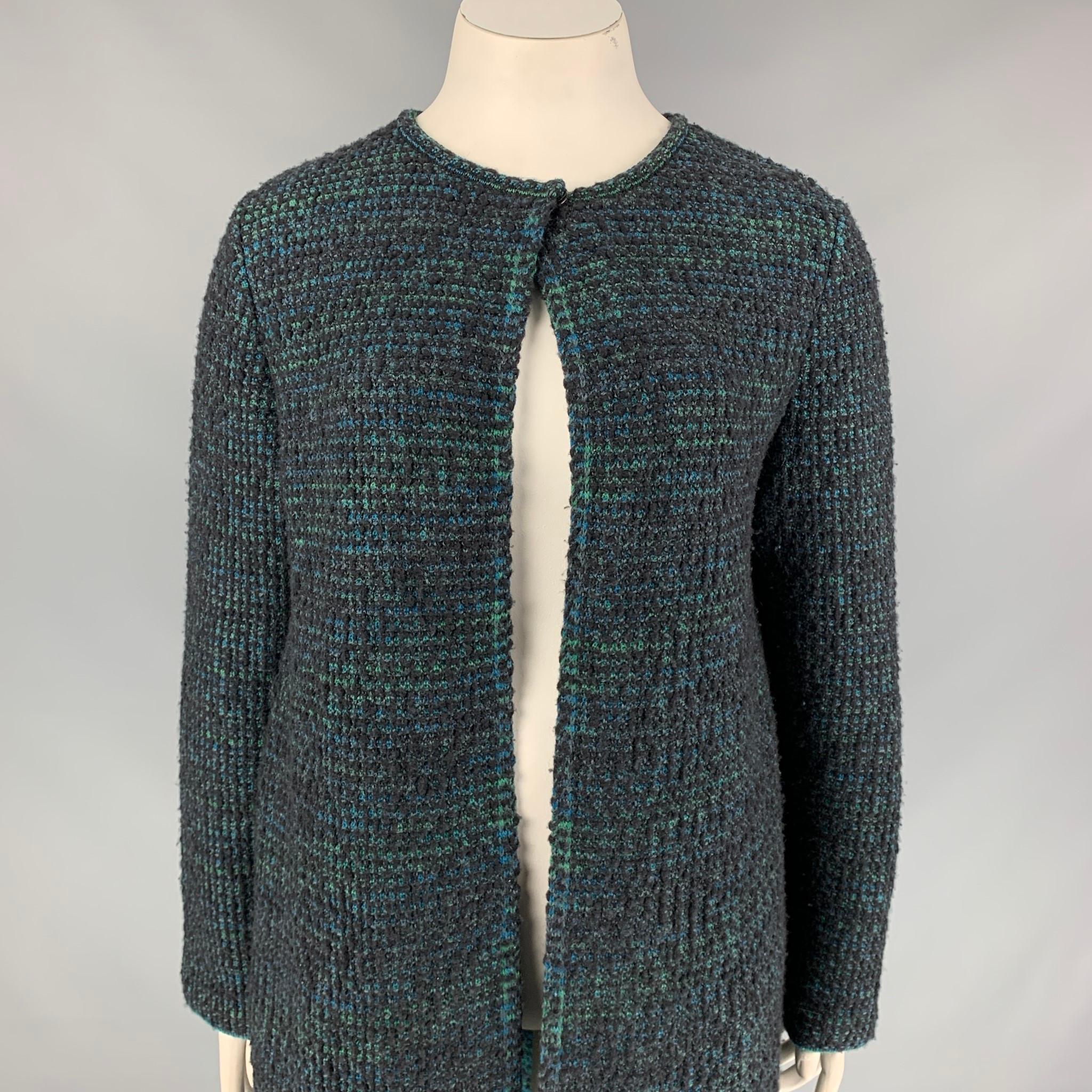 M MISSONI coat comes in a charcoal & green knitted wool featuring a single button closure detail and a open front. Made in Italy. 

Very Good Pre-Owned Condition.
Marked: 46
Original Retail Price: $925.00

Measurements:

Shoulder: 18 in.
Bust: 42