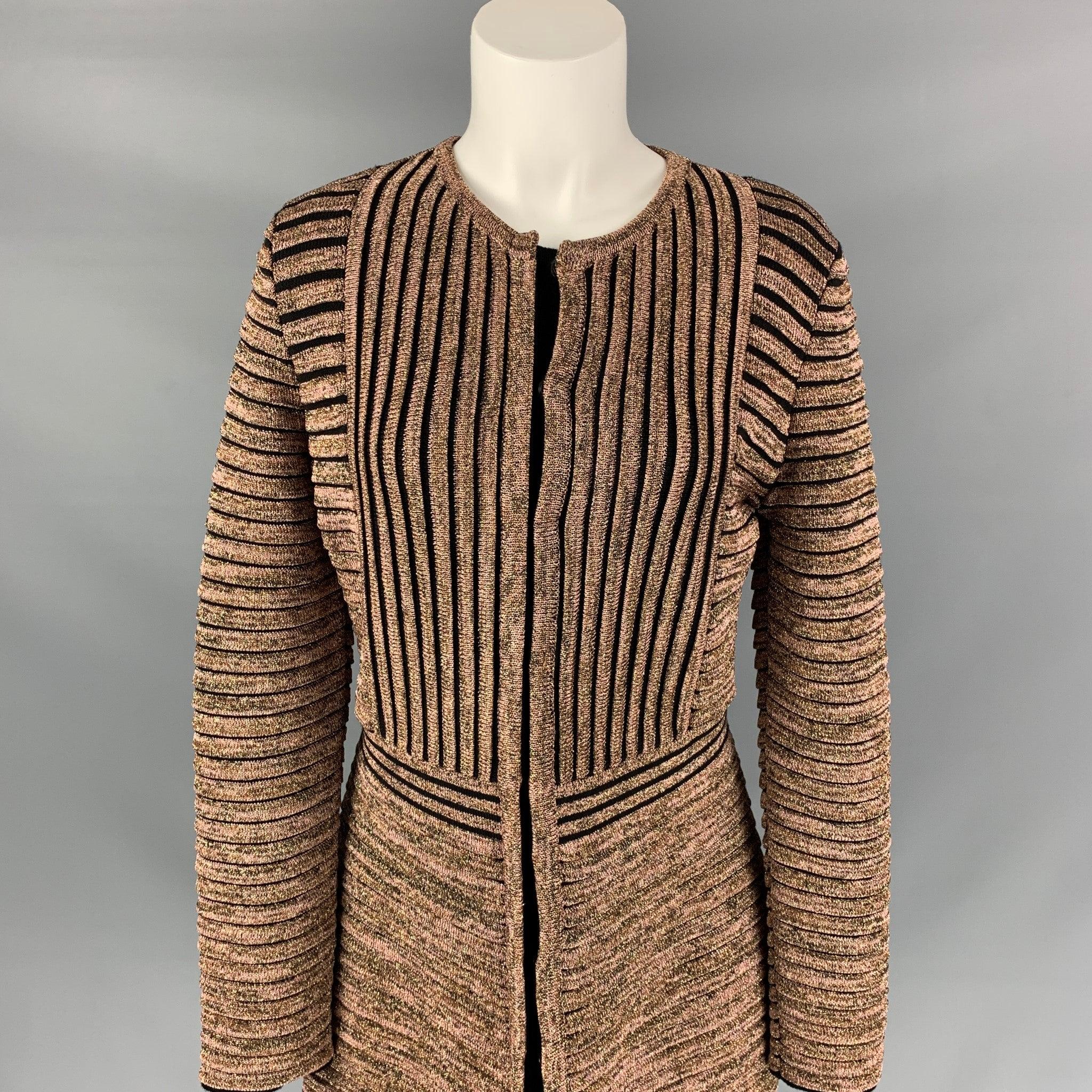 M MISSONI coat comes in a gold & black metallic wool / viscose featuring an a-line style, collarless, and a snap button closure. Made in Italy.
Very Good
Pre-Owned Condition. 

Marked:  I 44 / D 38 / A 38 / EFB 40 / GB 12 / US 8 

Measurements: 
