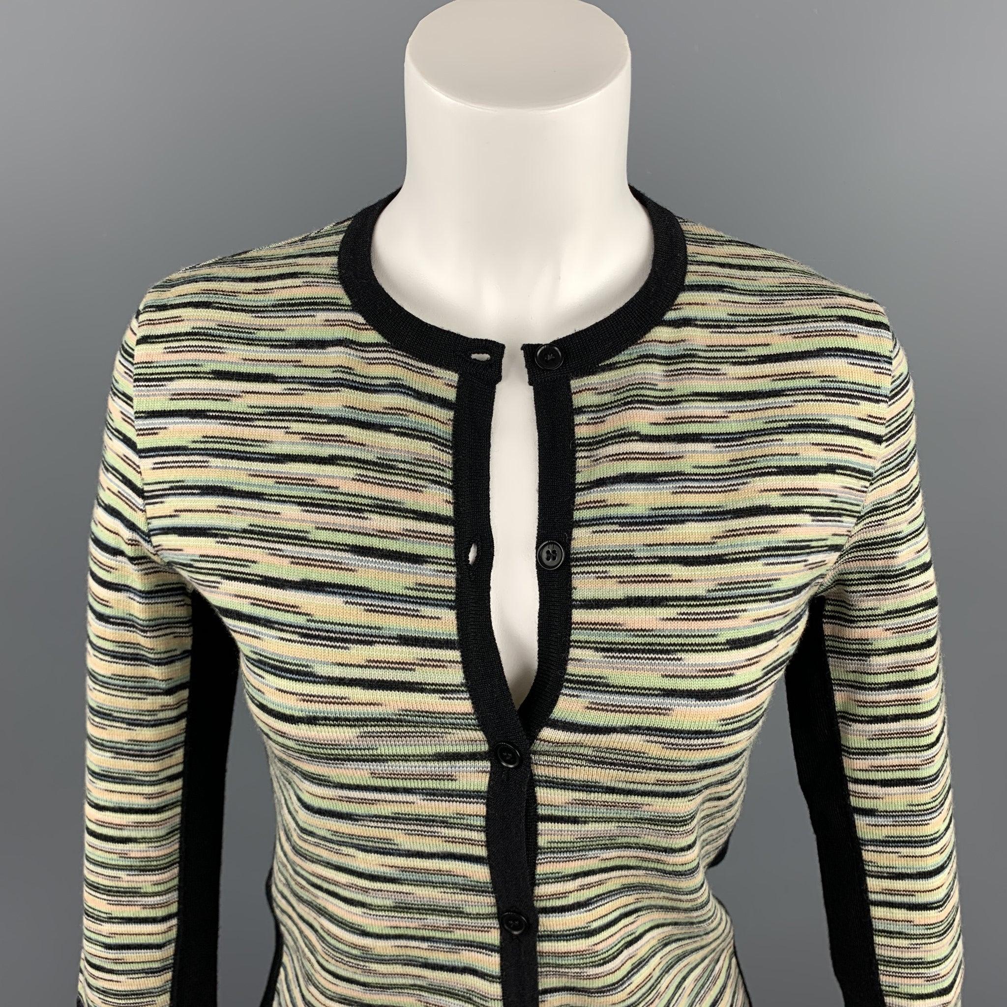 M MISSONI cardigan comes in a green knitted wool / acrylic with a black trim featuring a buttoned closure. Made in Italy. Matching top available.Excellent
Pre-Owned Condition. 

Marked:   US 8 

Measurements: 
 
Shoulder: 14 inches 
Bust: 34 inches
