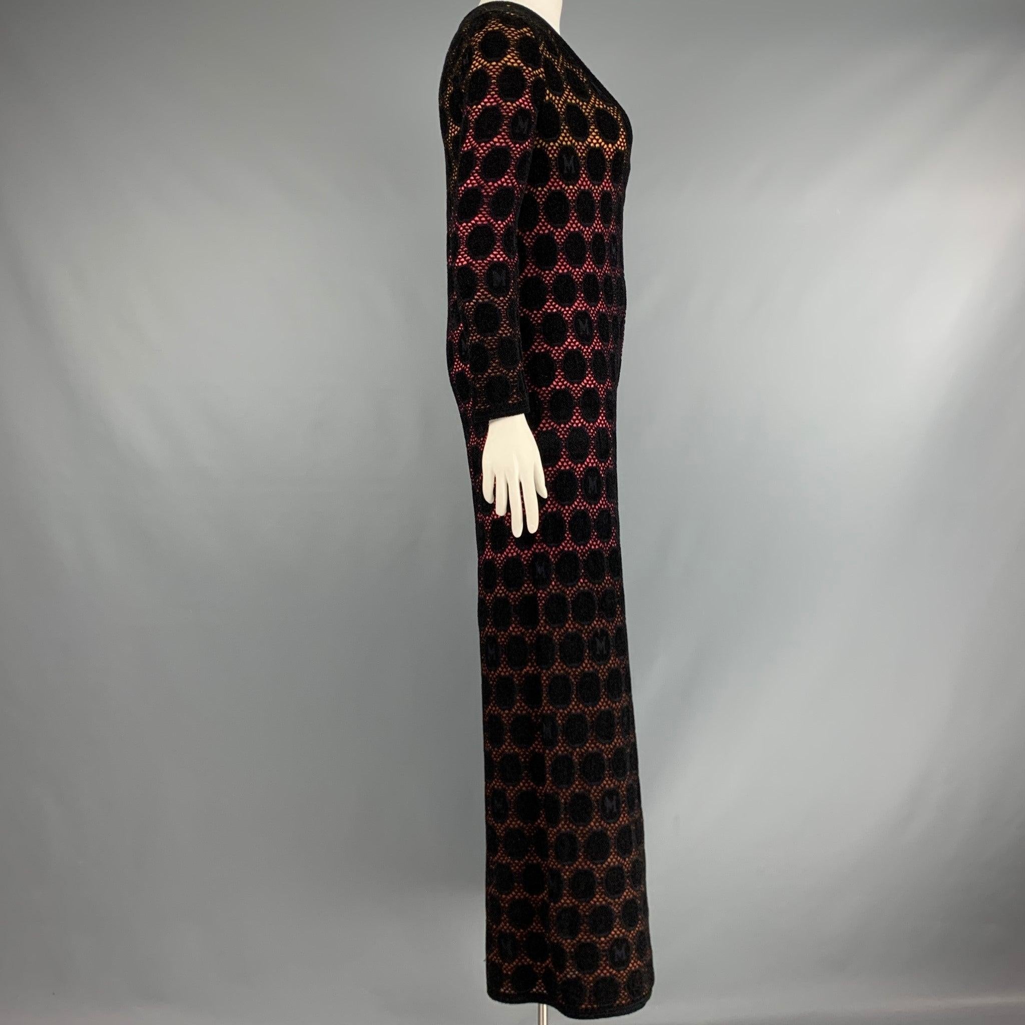 M MISSONI jumpsuit
in black knit fabric with yellow and pink ombre details featuring a wide leg style, and V-neck. Made in Italy.Excellent Pre-Owned Condition. Minor signs of wear. 

Marked:   size not marked. 

Measurements: 
  
Shoulder: 15 inches