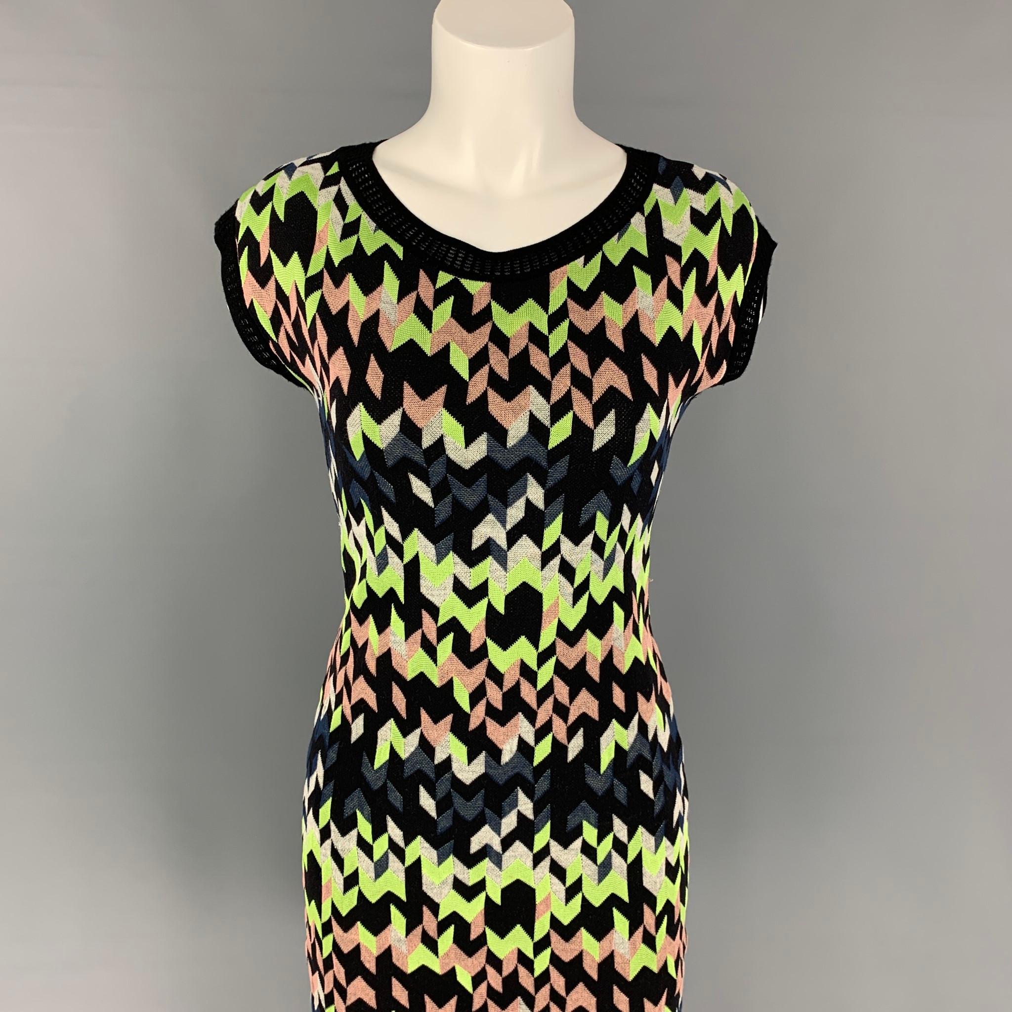 M MISSONI dress comes in a multi-color geometric knitted material featuring a sleeveless style, a-line, and a scoop neck. 

Very Good Pre-Owned Condition. Fabric tag removed.
Marked: Size tag removed.

Measurements:

Shoulder: 17 in.
Bust: 34