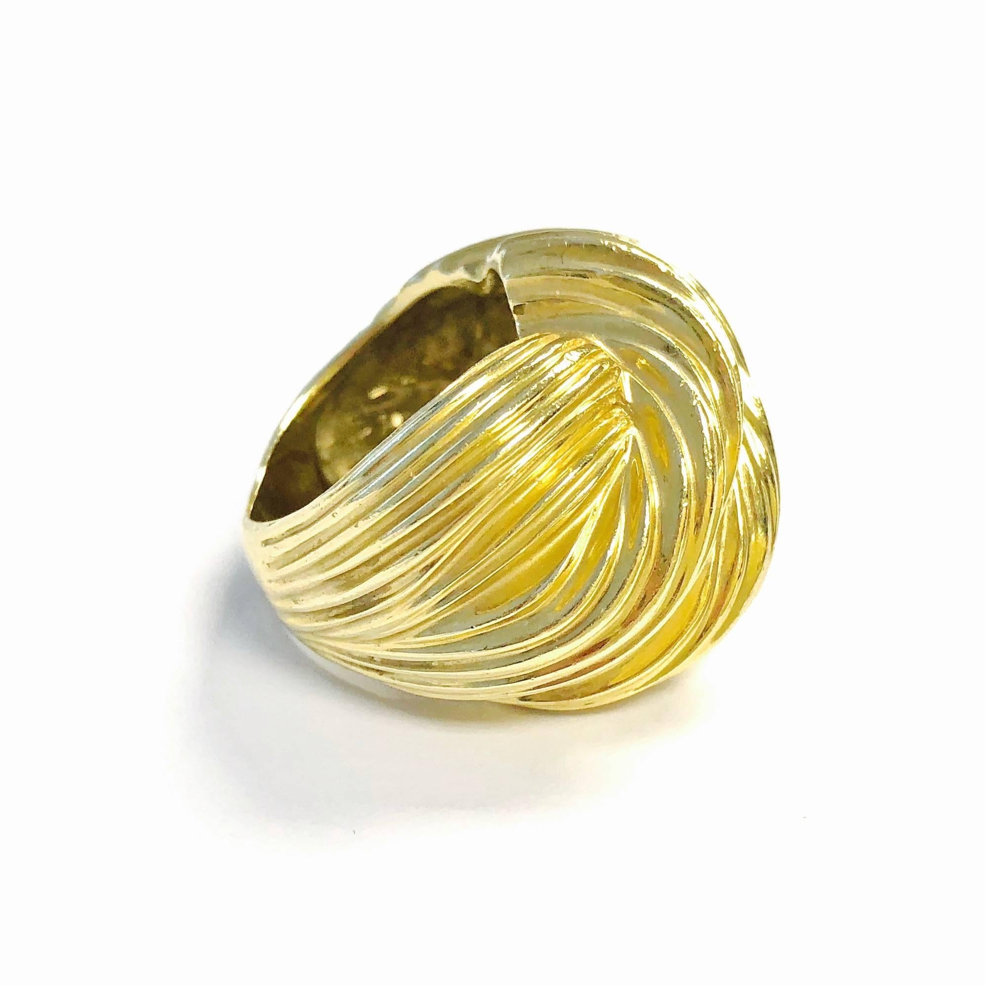 Rotkel 14K yellow gold large domed textured ribbons knot style ring.
Measurements: 
Front: 1 1/16 inch W x 13/16 inch H x 3/8 inch D
Weight: 17.9 grams
Size: 6.5 (Sizable)
Marked: Rotkel 14K Made in USA
