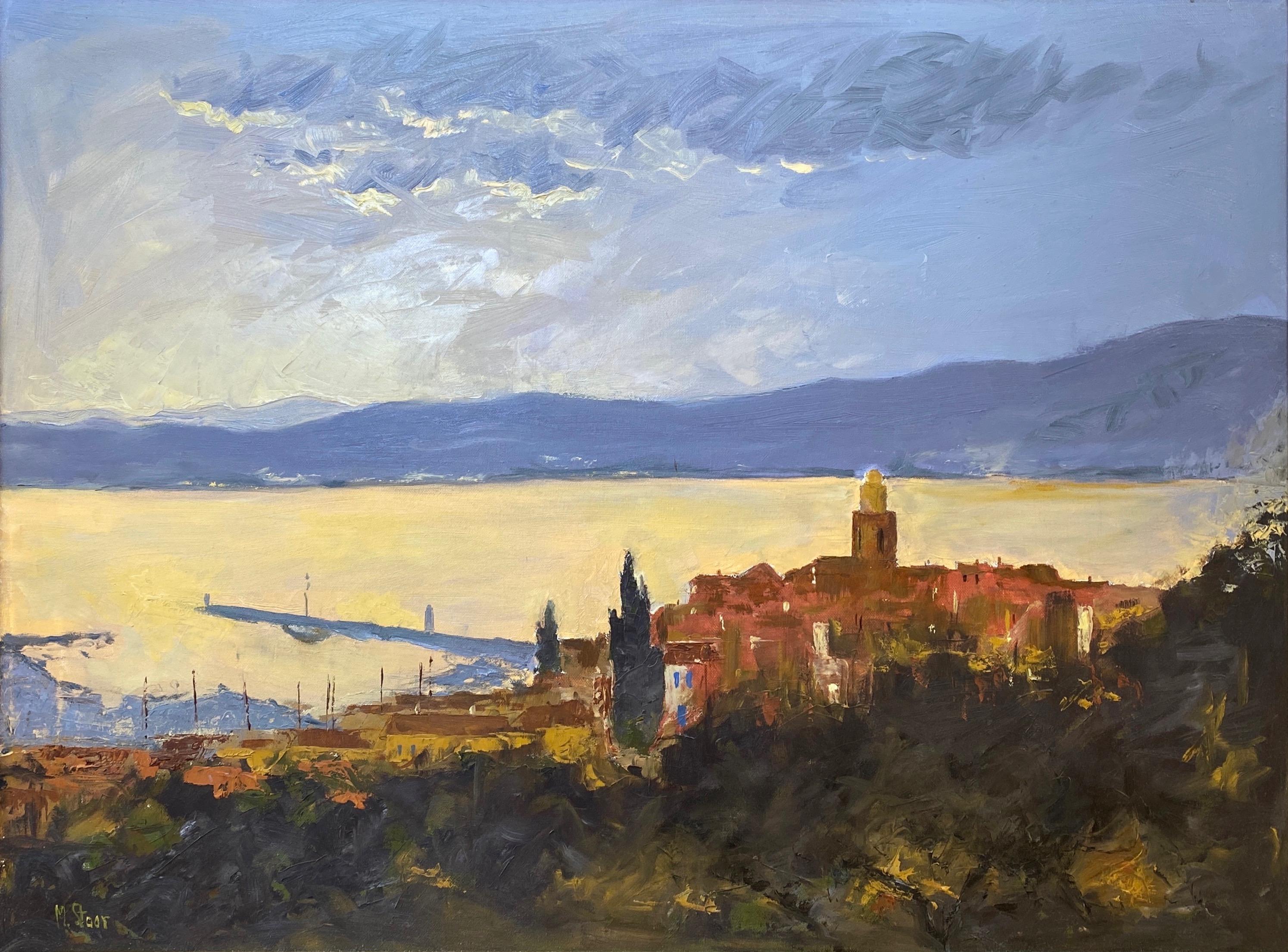 A lovely 1970s untitled impressionist oil painting on canvas of Saint-Tropez, France, as seen from the town’s historic Citadel, a hilltop fortress built in 1602 that affords one panoramic views of the bay. Signed “M. Staar” or 