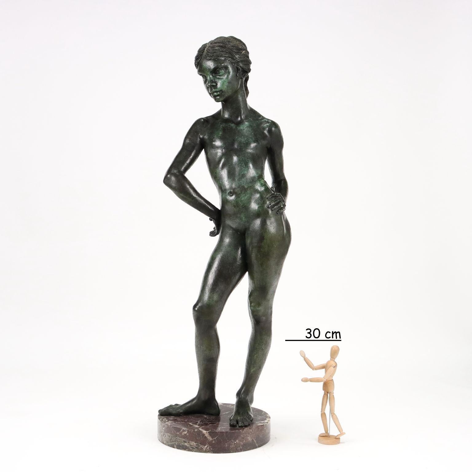 Bronze sculpture depicting a little girl. Work entitled 