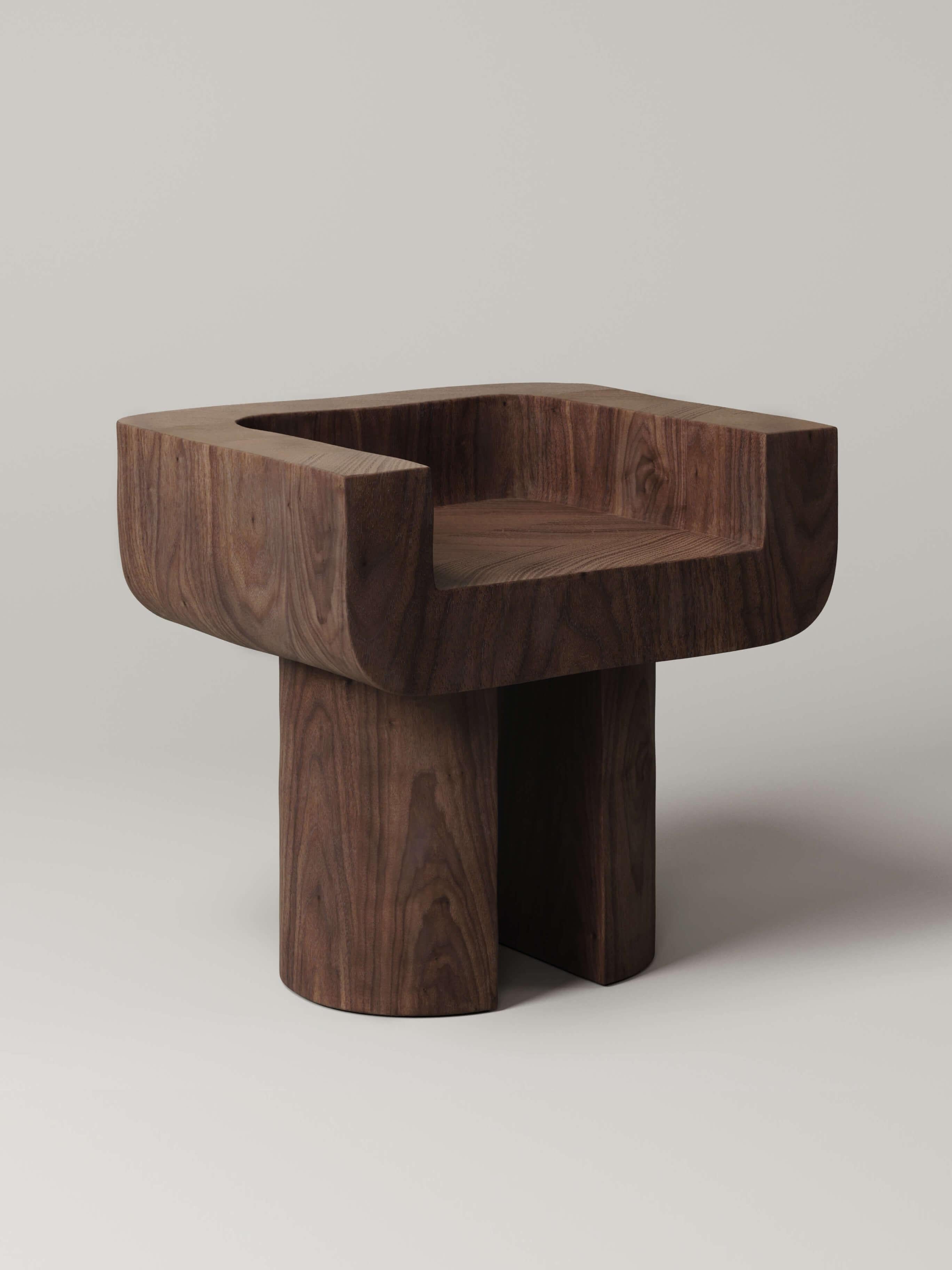 Carved from thick walnut, the heavily proportioned silhouette, smooth curves, and powerful stature of the M_001 chair push the limits of chair design.

Numbered, Signed, and includes Certificate of Authenticity

*Given the unique nature of walnut,