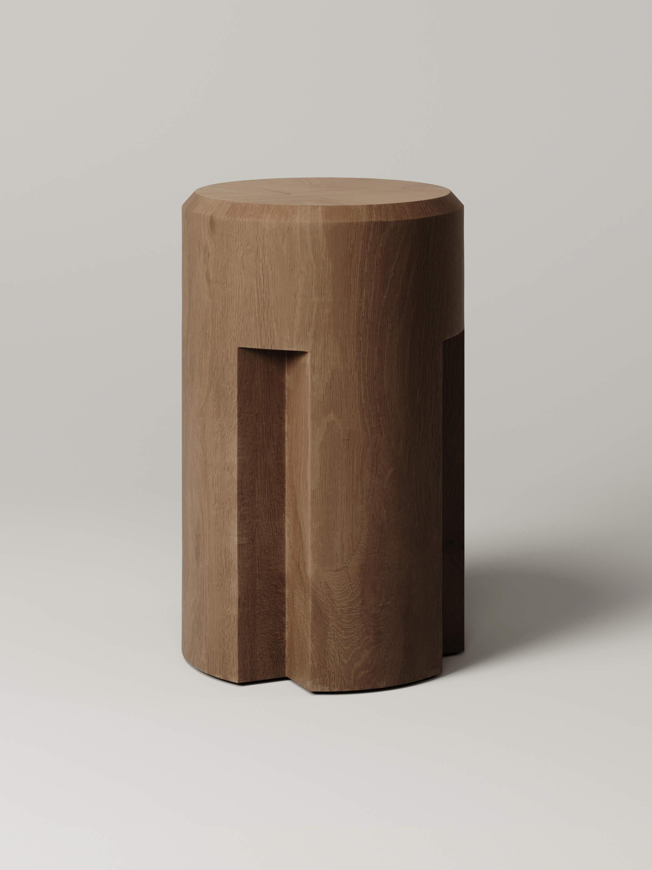 Crafted from white oak, the cylindrical form, sharp cutouts, and gentle sloping bevel of the M_002 Counter Stool blend to create a sophisticated brutalist masterpiece.

Designed in collaboration with Studio Le Cann
Numbered, Signed, and includes