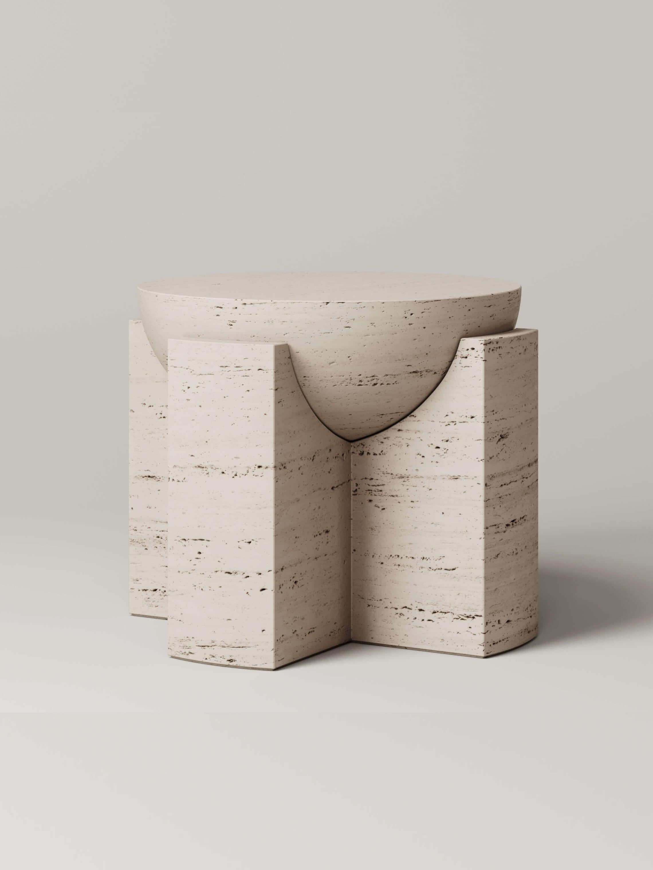 Composed of two pieces of carved stone, the half-dome sphere of the M_002 side table floats effortlessly within its base. The sculptural and heavily proportioned form is simultaneously a functional object and a piece of art.

Designed by Studio Le