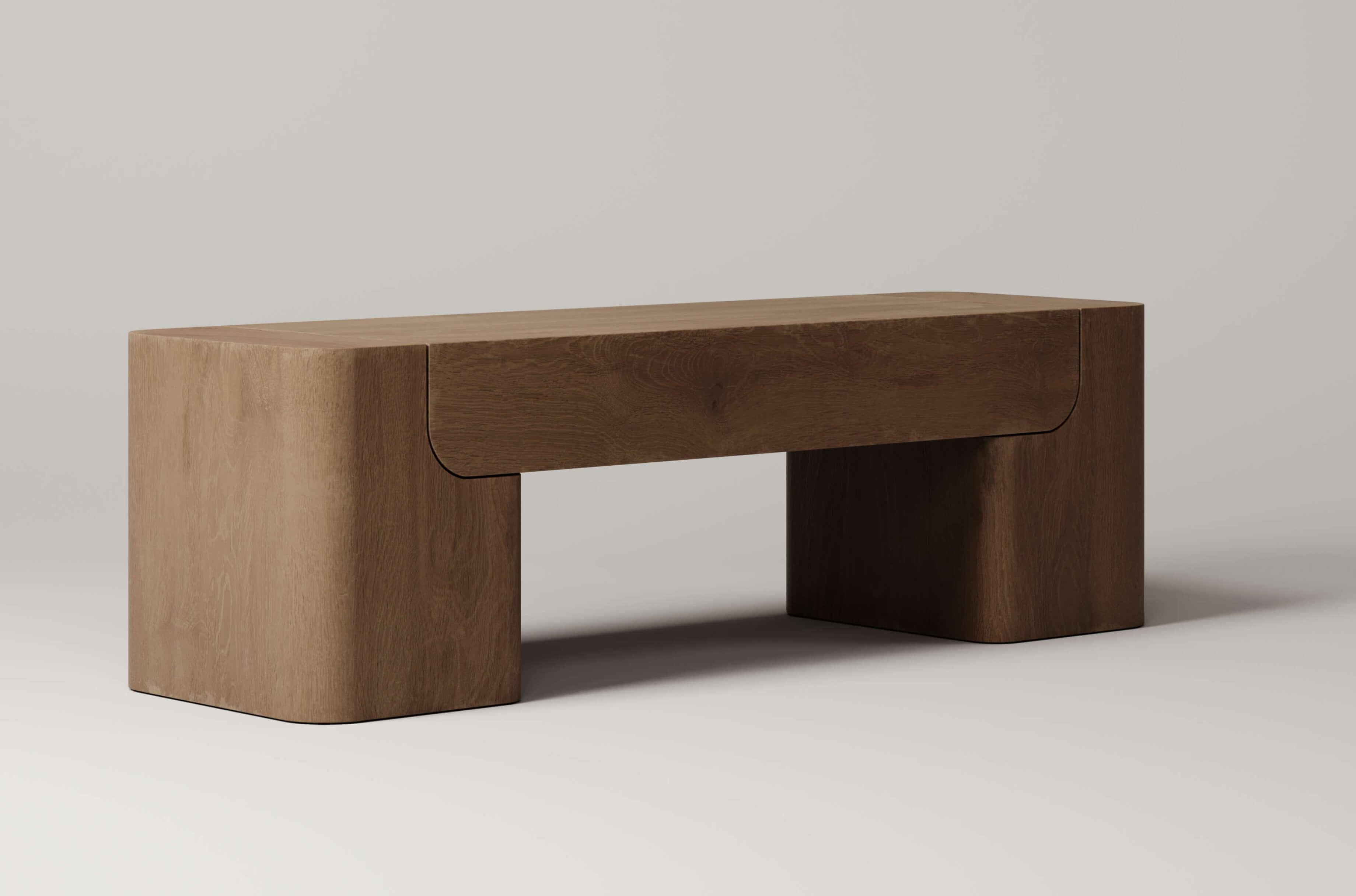 Crafted from 3 precisely carved blocks, the curved figure of the M_005 Bench emphasizes the connection between its parts. Its soft curves playfully bend the structure, its engineering reflecting the architectural elegance of a simple bridge.