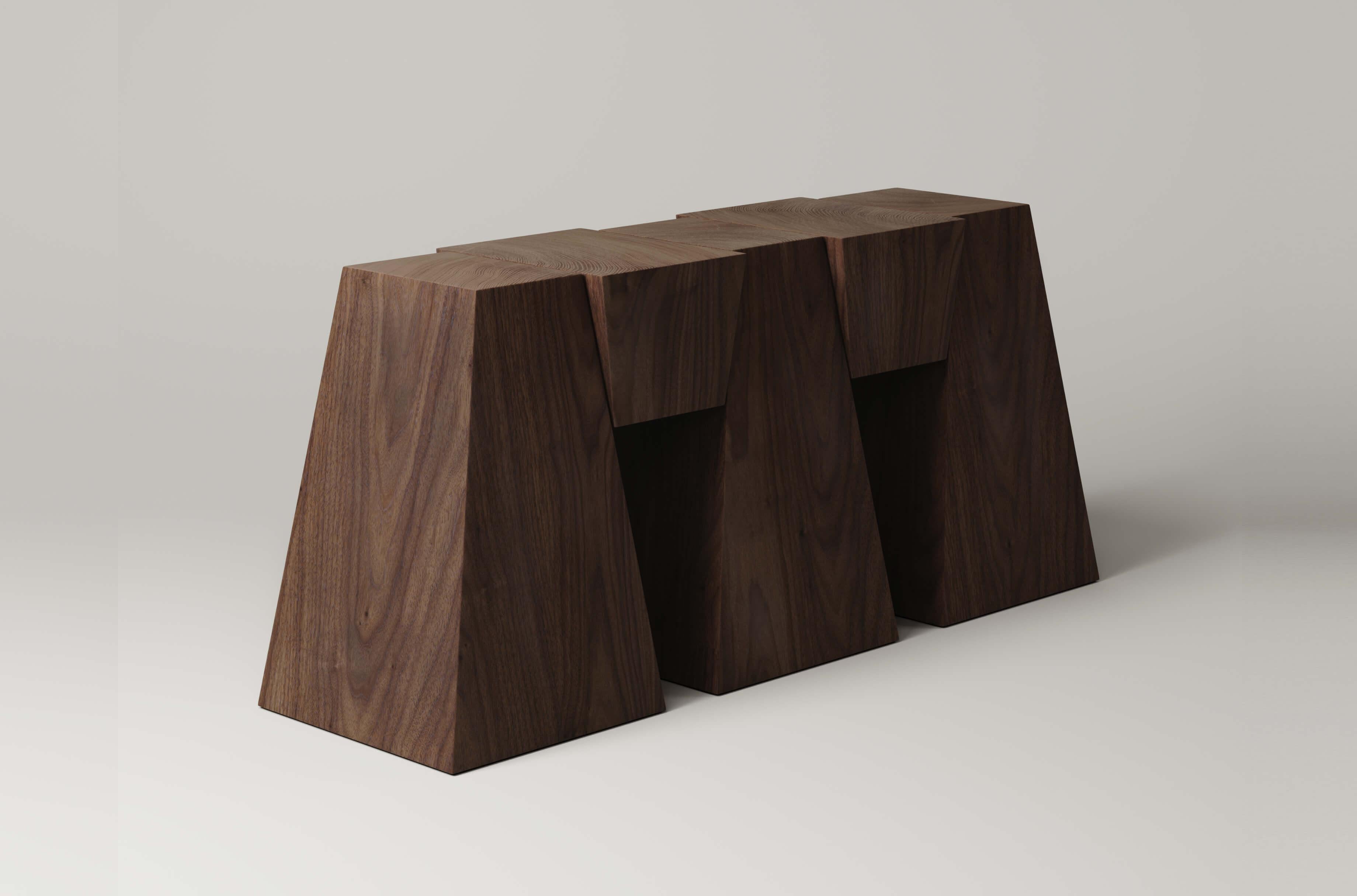 Assembled from 5 vertical obelisks, the sophisticated inverse geometry of the M_006 Console appears to playfully tease gravity. Leveraging the engineering of a keystone the push and pull of its blocks play with your sense of depth and