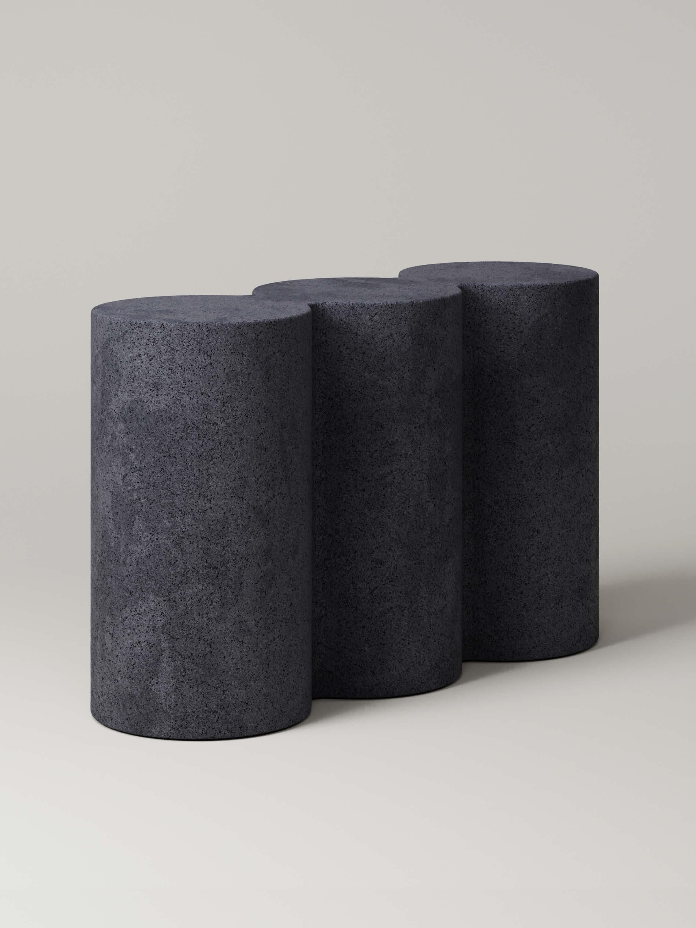 Carved from a single stone, the rippled form of the M_008 Console playfully softens the space around it. Designed by Benni Allan for Monolith its sculptural triple column geometry offers a versatile stage for curated objets d'art.

*Given the unique