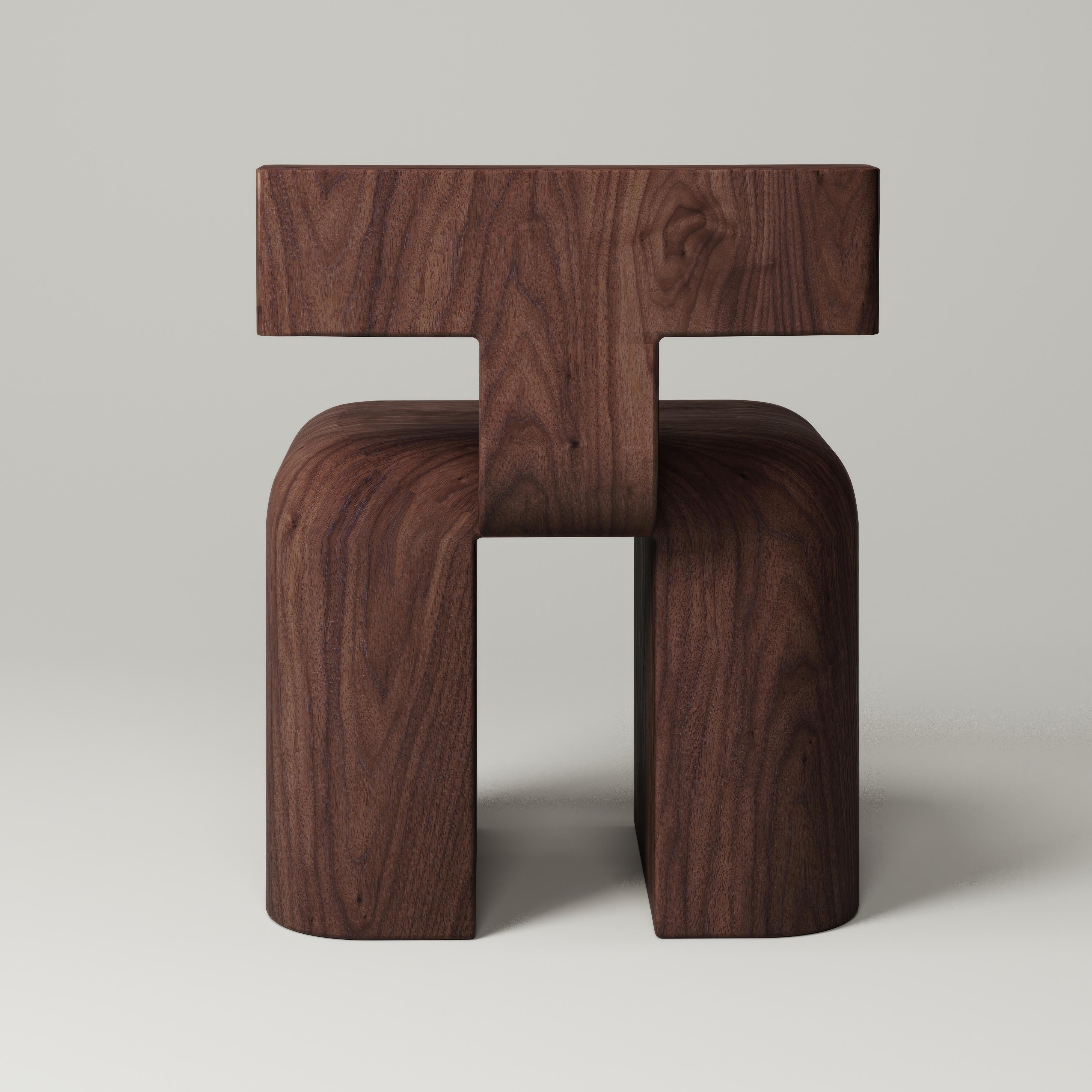 The M_013 Chair is softly carved from solid walnut. It's heavily proportioned base and sculptural form make this chair a unique addition to any interior. 

NYC-based design studio Monolith focuses on collectible furniture and homeware by exalting