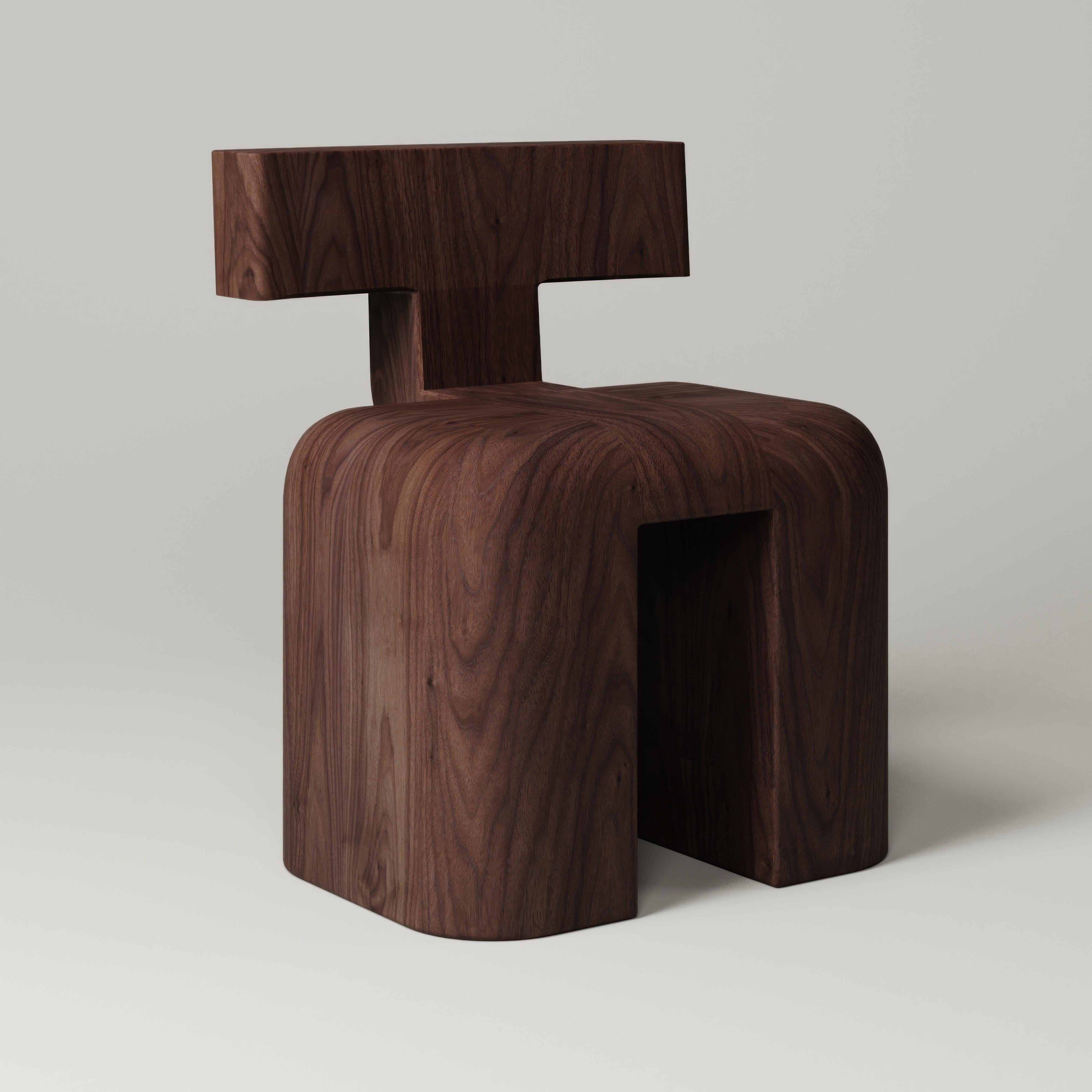 M_013 Walnut Dining Chair by Monolith Studio
Signed and Numbered.
Dimensions: D 40 x W 56 x H 71 cm. 
Materials: Walnut.

Available in travertine, lava rock, onyx, walnut and white oak (on request). Please contact us. 

Monolith, founded in 2022 by