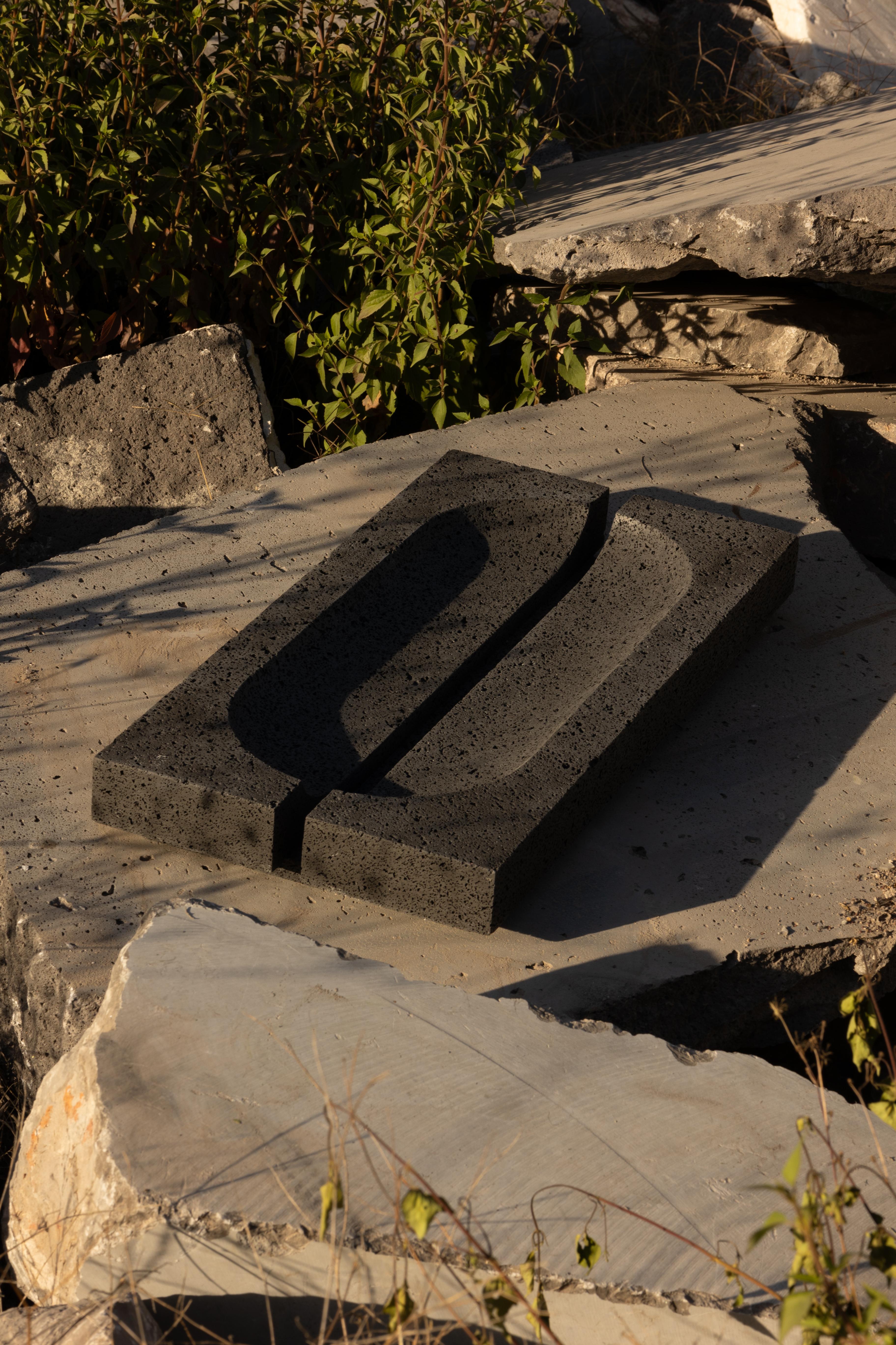 M_015 Lava Rock Trench Bowl by Monolith Studio
Signed and Numbered.
Dimensions: D 70 x W 35 x H 8 cm. 
Materials: Lava rock.

Available in travertine and lava rock. Please contact us. 

Monolith, founded in 2022 by Marc Personick, leans on solid