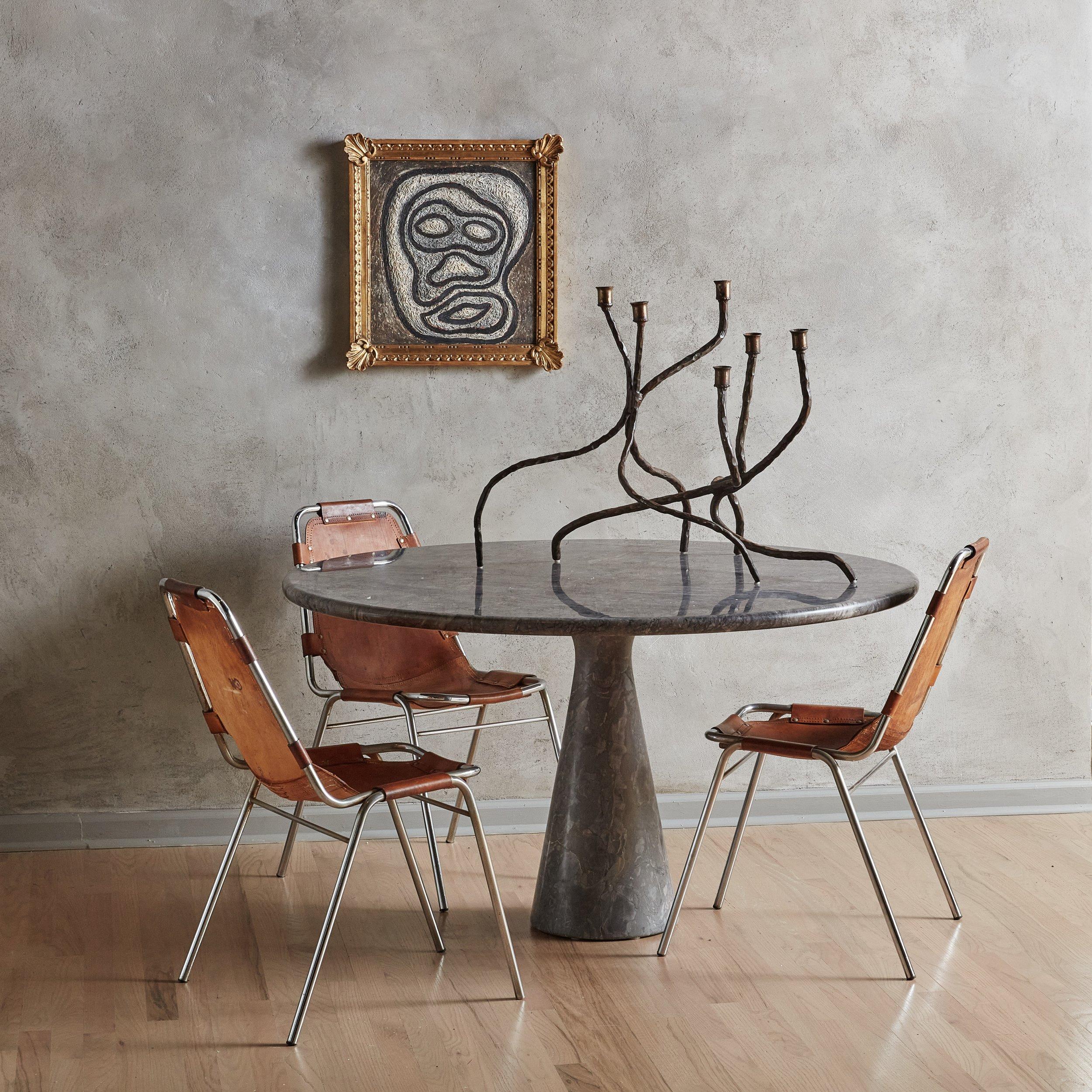 A rare M1 T70 Table was designed by Mangiarotti in 1969 for Skipper. Mangiarotti’s vision was to create a table that respected the materiality of the marble without utilizing any joints in the design. The heavy table top rests on the conical