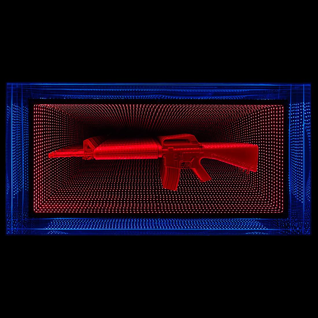 Mirror M16 Led Light wall decoration mirror made
with mirrored led lights with glass and plexiglass
creating an infiny mirrored effect. With an art demo
gun M16 in resin. Exceptional piece made in 2020
by Raphael Fenice.