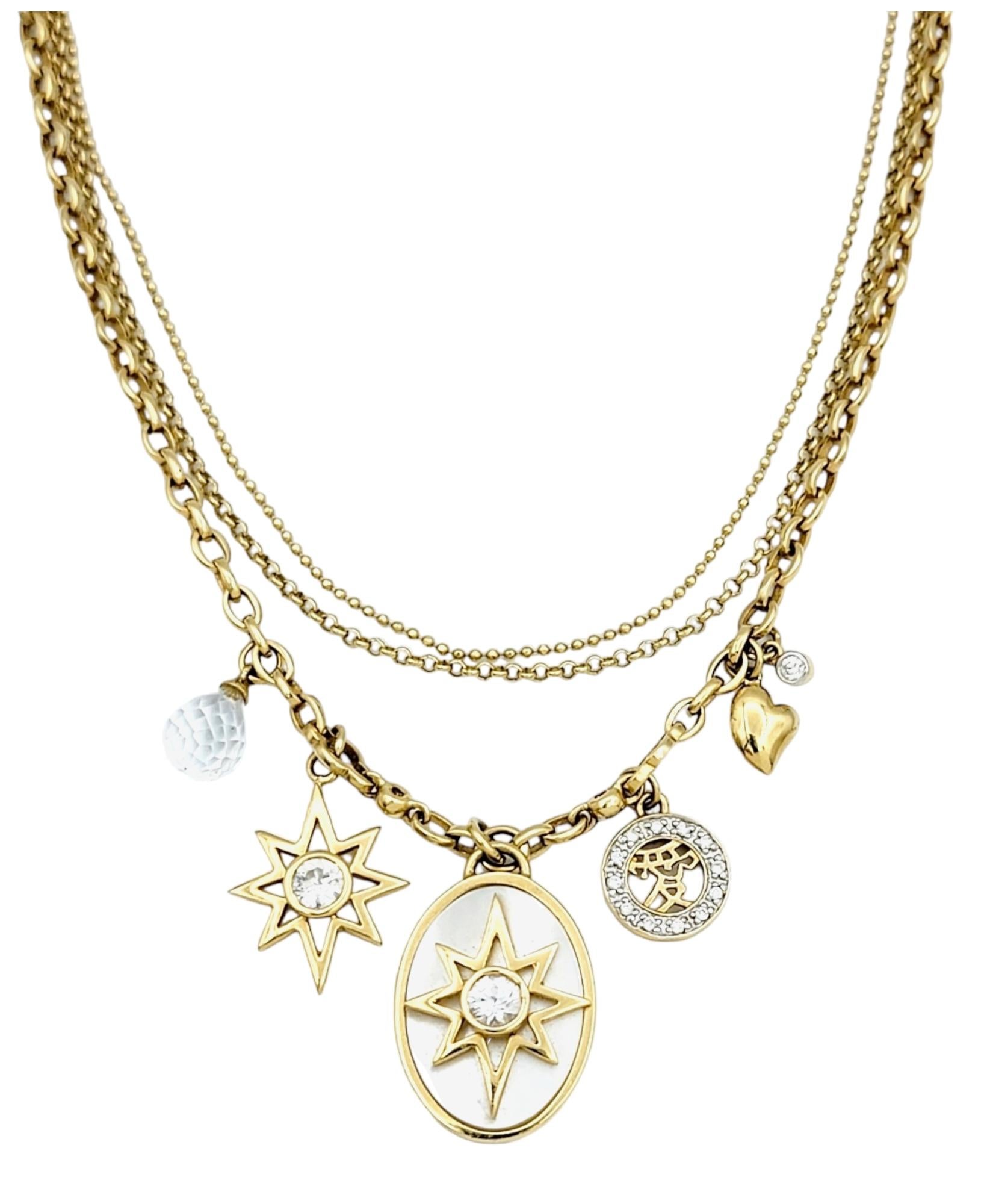 This wonderfully designed multi-chain layered charm necklace by M2 by Mary Margrill is sure to become one of your new favorite pieces.  This exquisitely crafted necklace is a stunning blend of textures, tones, and gemstones, culminating in a