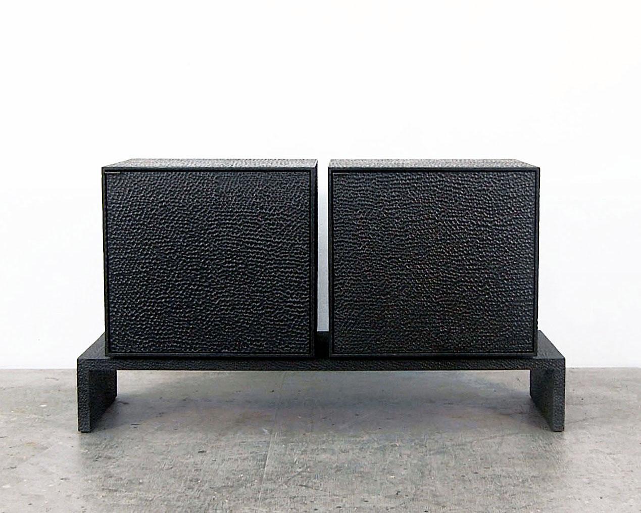 M2 credenza cabinet by John Eric Byers
Dimensions: D 71 x W 132 x H 46 cm
Materials: carved + blackened + maple + brass

All works are individually handmade to order.

John Eric Byers creates geometrically inspired pieces that are minimal,