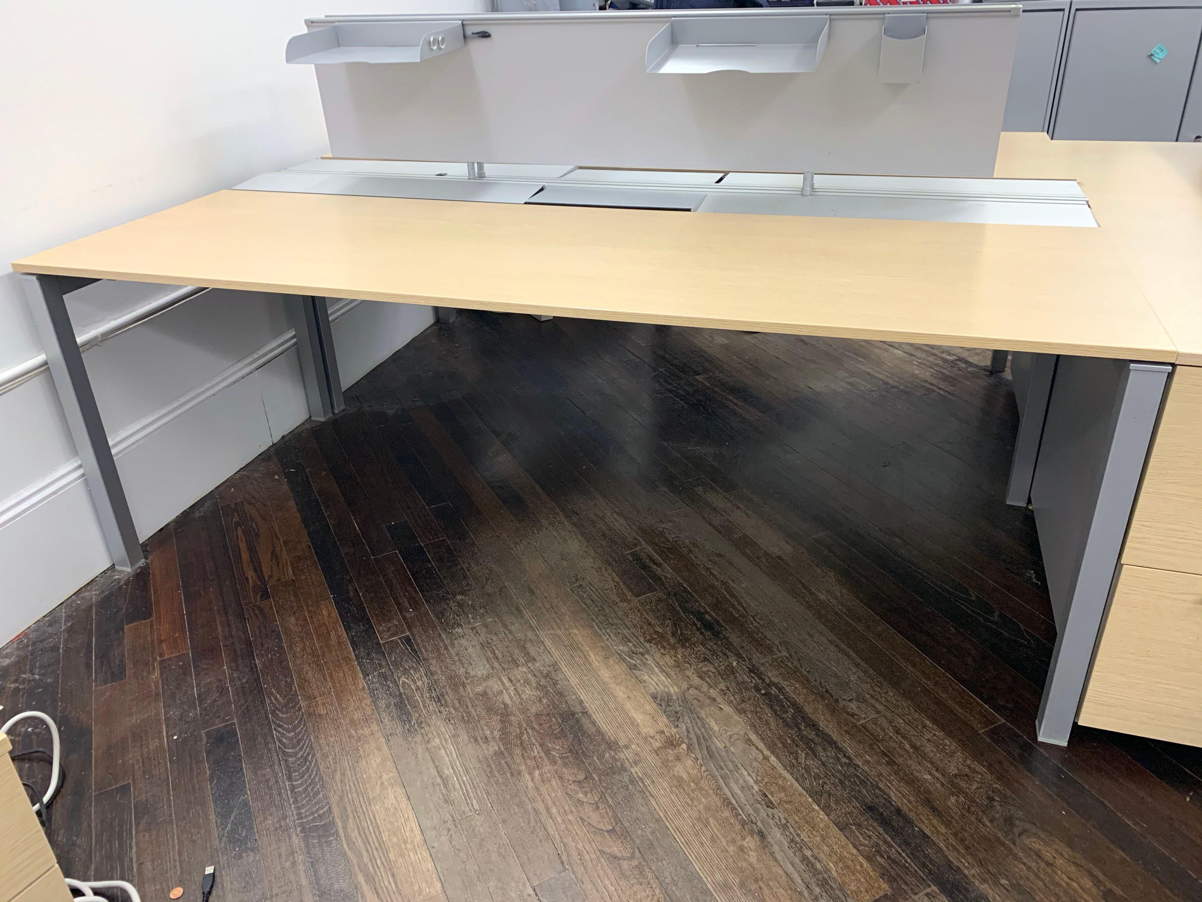 Desk with four powder coat silver legs
Laminate with the look of veneer.