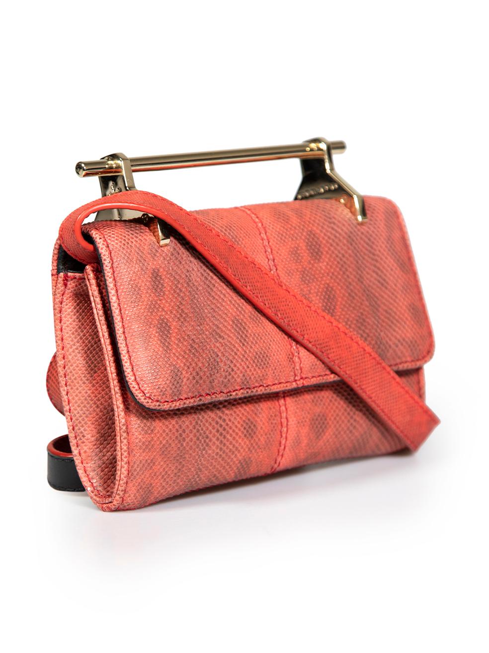 CONDITION is Very good. Minimal wear to bag is evident. Tarnishing to metal hardware on this used M2Malletier designer resale item.
 
 
 
 Details
 
 
 Red
 
 Leather
 
 Mini top handle bag
 
 Animal print
 
 Lizard embossed
 
 Gold tone hardware
 
