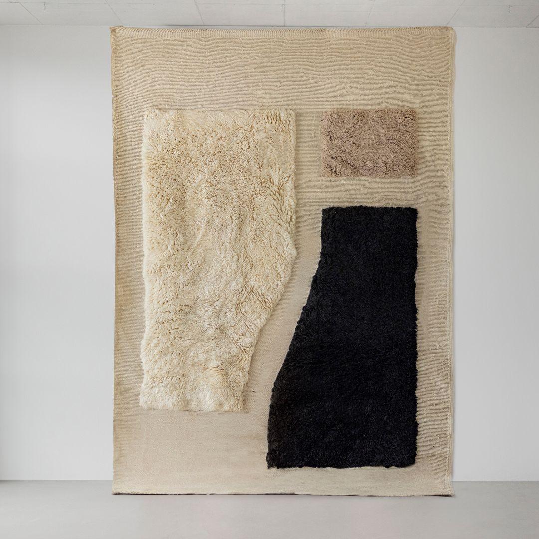 This meticulously crafted Berber rug features an elegant design, highlighted by refined patterns in a harmonious color palette. Gentle curves while integrating subtle architectural shapes create a striking centrepiece for an array of interiors.

The