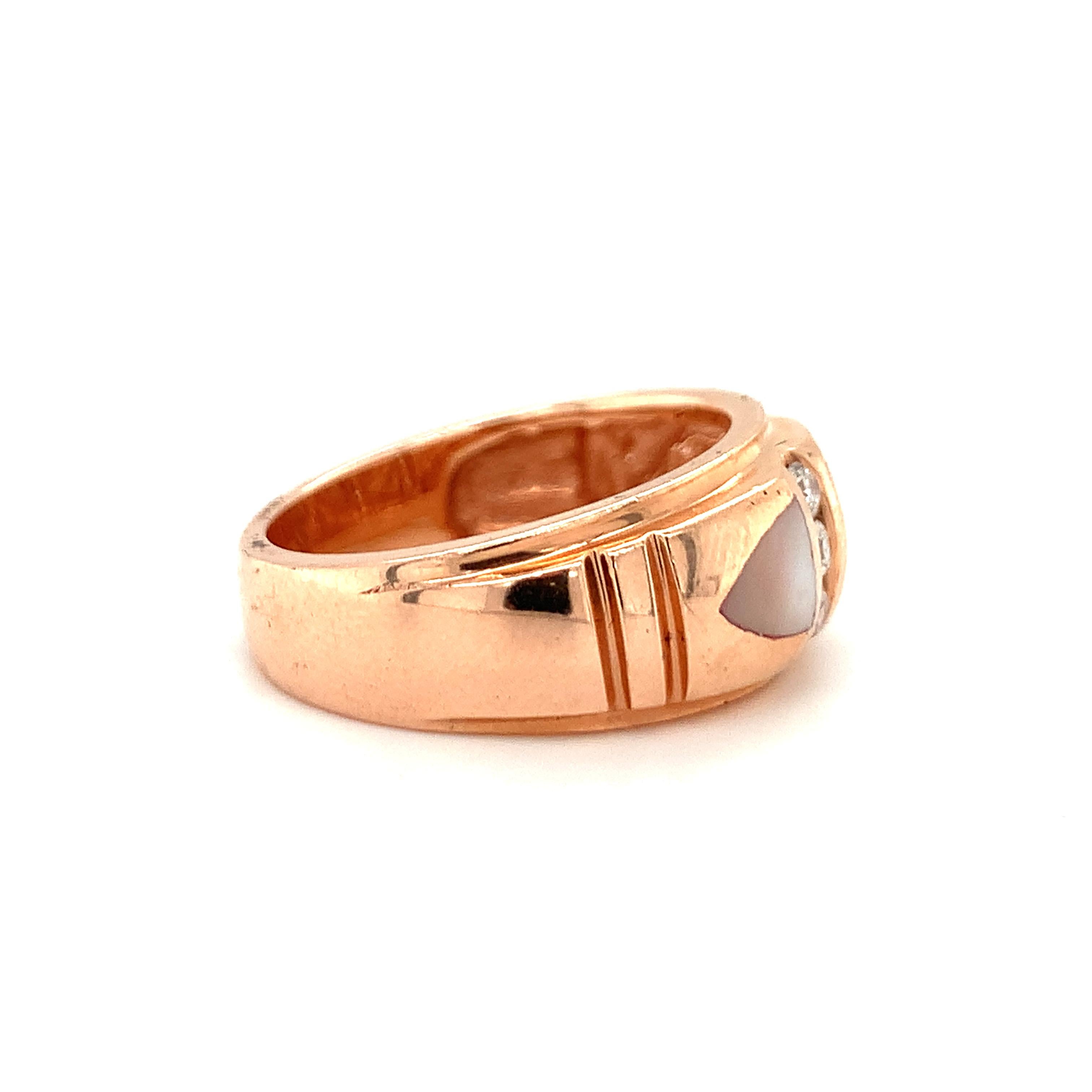 This splendid 14K rose gold ring features a lustrous mabe pearl, beautifully complemented by six channel-set round brilliant-cut diamonds totaling 0.25 carats, with H color and SI-1 clarity. The diamond rows interspersed between the pearl sections