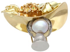 Mabe Pearl Fancy Yellow Diamond Ruby Sapphire and Emerald Yellow Gold Brooch