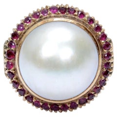 Mabé Pearl Ring With Ruby Halo Set in a Filigreed 18K Yellow Gold Mount