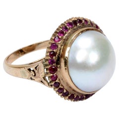 Mabé Pearl Ring With Ruby Halo Set in a Filigreed 18K Yellow Gold Mount