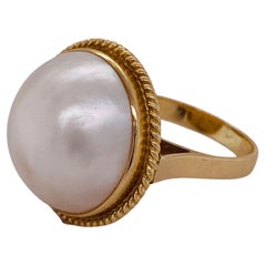 Mabe Pearl Rope Accent Round Dome Bezel Ring 14K Gold Hidden Floral Accent Mabe Pearl Rope Accent Round Dome Bezel Ring 14K Gold Hidden Floral Accent