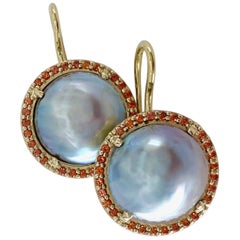 Mabe Pearl "Serendipity" Earrings with Orange Sapphire Halos in 18 Karat Gold