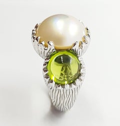 Mabe Pearl with Cabochon Peridot Ring Set in 18 Karat White Gold Settings
