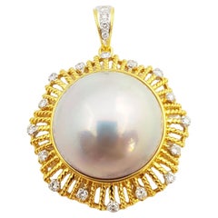 Mabe Pearl with Diamond Pendant Set in 18 Karat Gold Settings
