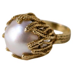 Bague cocktail en or jaune et perles