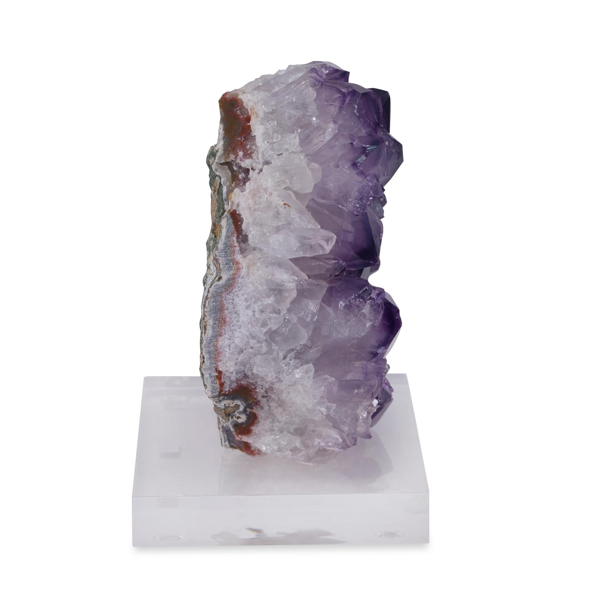 An amethyst druze mounted on a clear acrylic base. Due to the natural material, variation in size, shape, and color is to be expected.
      