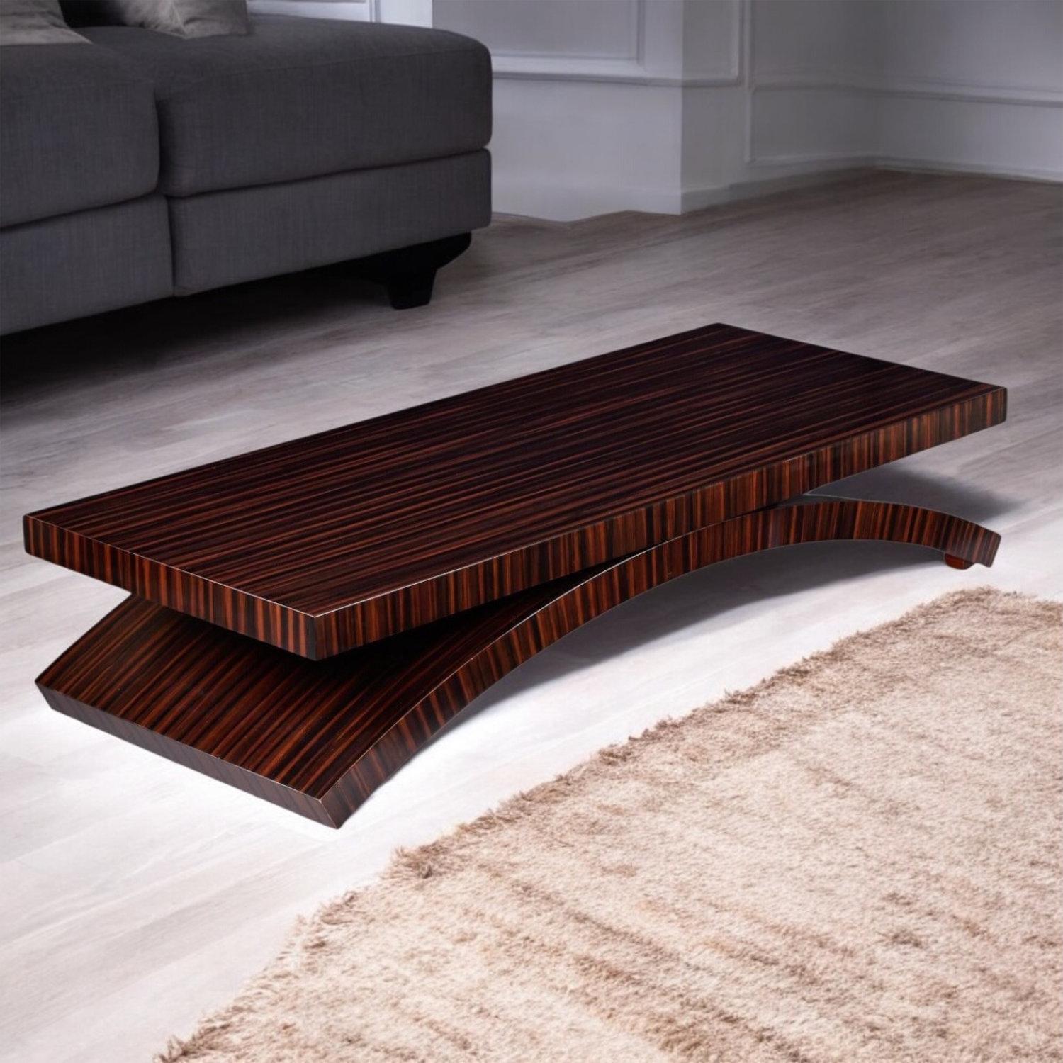 Esta impresionante mesa de centro con arco fue diseñada por Michael Vanderbyl para Boiler Domicile. Esta versión sobredimensionada de 72