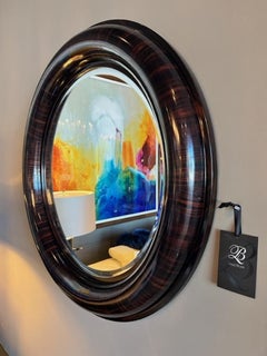 Macassar ebony round beveled mirror