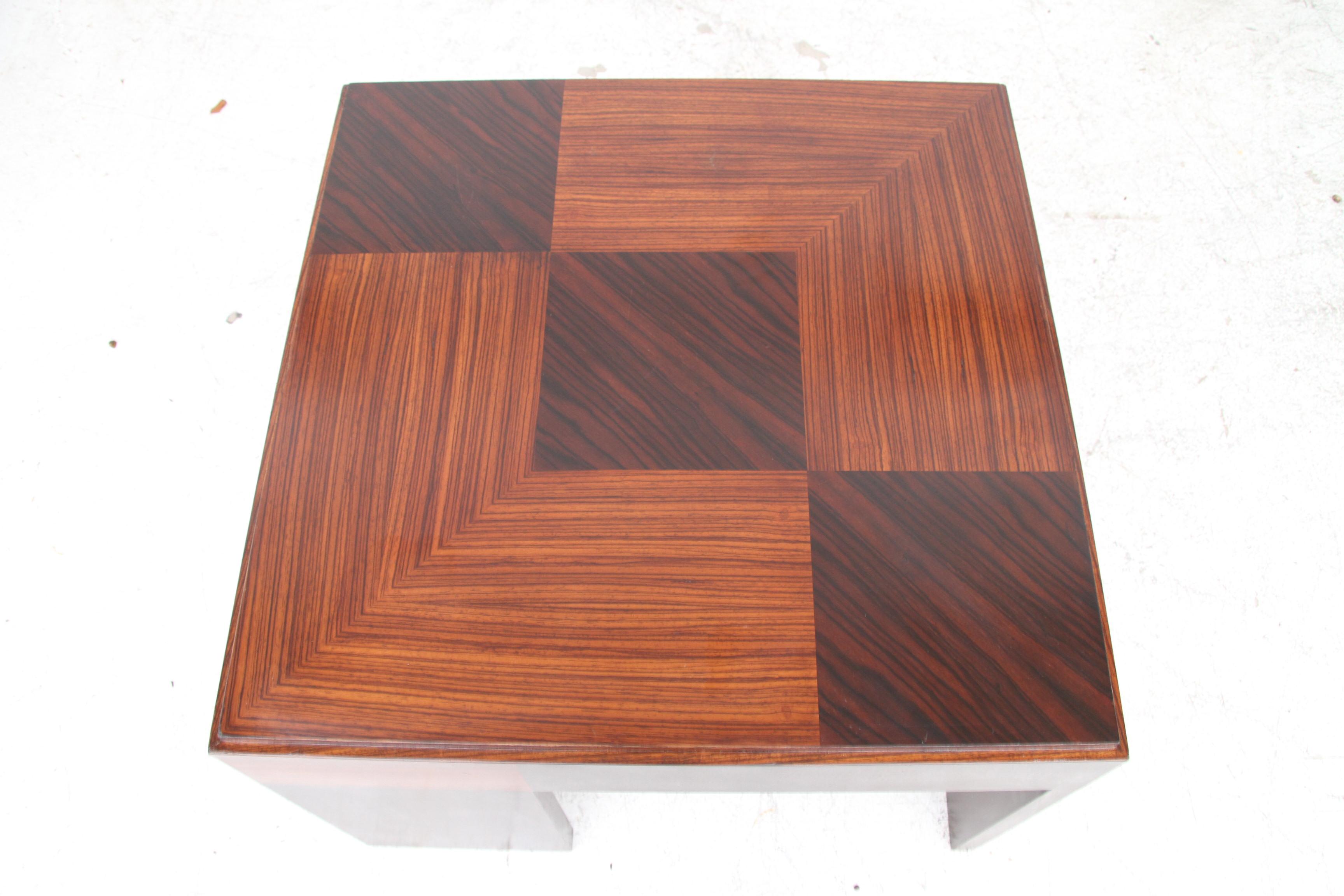 Macassar Ebony Widdicomb Side Table.

John Widdicomb side or coffee table. Patchwork design in bleached and ebony macassar with walnut legs. Manufacturer's mark.