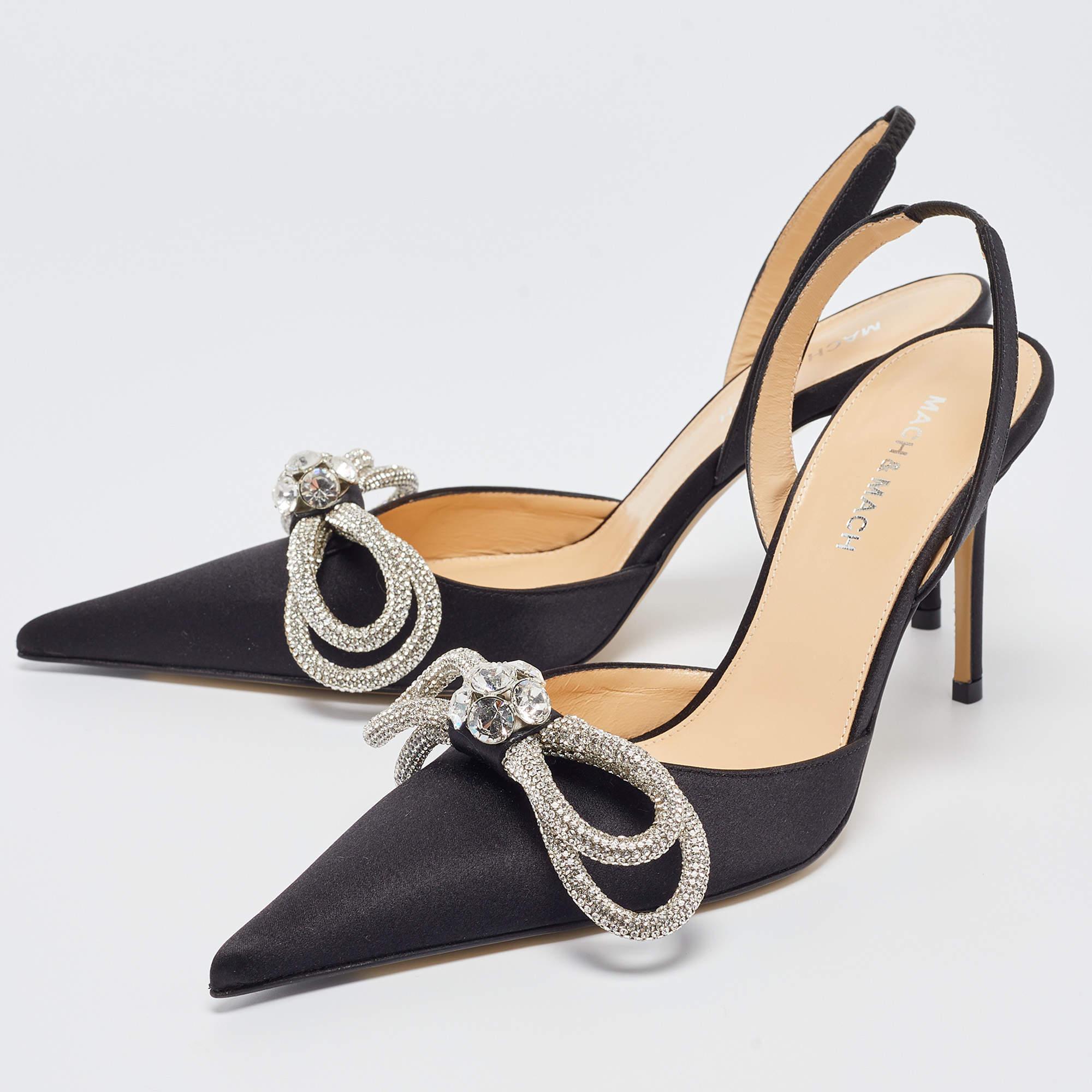With a striking silhouette, this pair of Mach & Mach pumps is classy and peculiar. It is adorned with crystal embellishments, and its 10cm heels will elevate you with ease. Made from satin, it features a black shade and will lend you an elongated