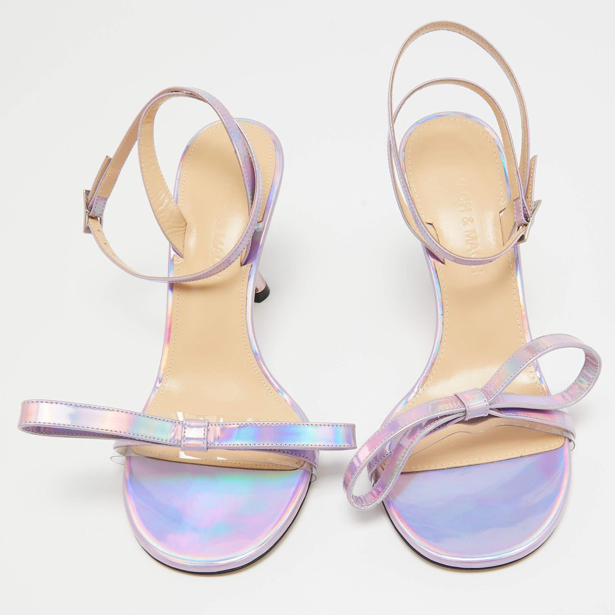 Discover footwear elegance with these Mach & Mach iridescent purple sandals. Meticulously designed, these heels marry fashion and comfort, ensuring you shine in every setting.

Includes
Original Dustbag, Original Box, Extra Heel Tips, Info Card