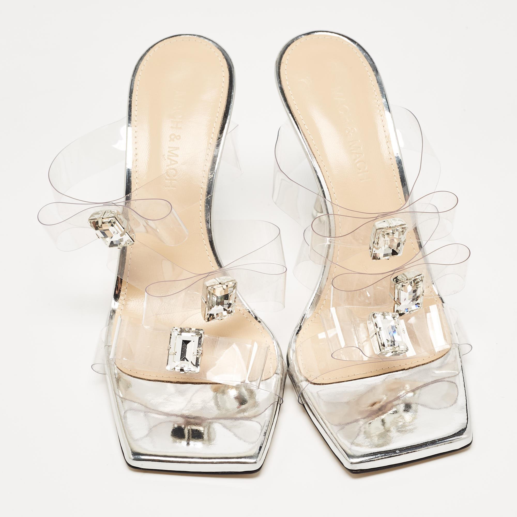 Slip into the epitome of playful luxury with Mach & Mach's sandals. Crafted with meticulous attention to detail, these sandals feature a charming French bow accent, they are crafted using PVC for a captivating, statement-making look.

Includes: