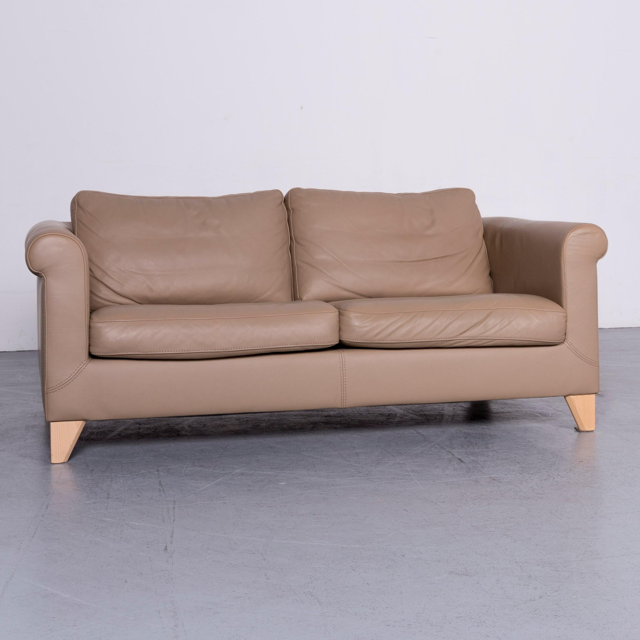 We bring to you a Machalke designer leather sofa beige two-seat couch.